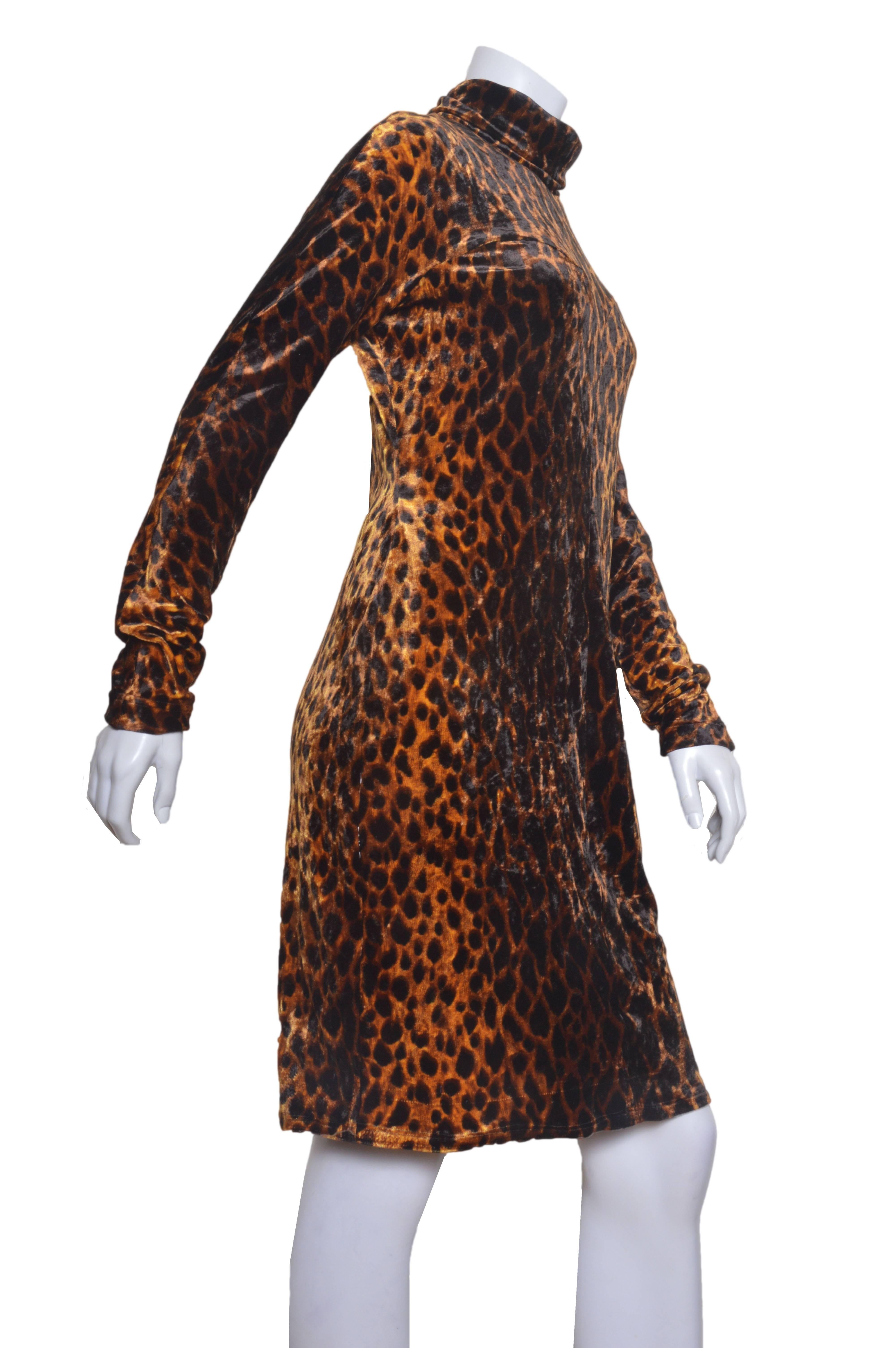 Vintage Versace Couture leopard print dress.
Circa 1992 (or early1990's.)
Stretchy velour.
High neck, hourglass shape.
Back zipper.
Tagged a size 46.