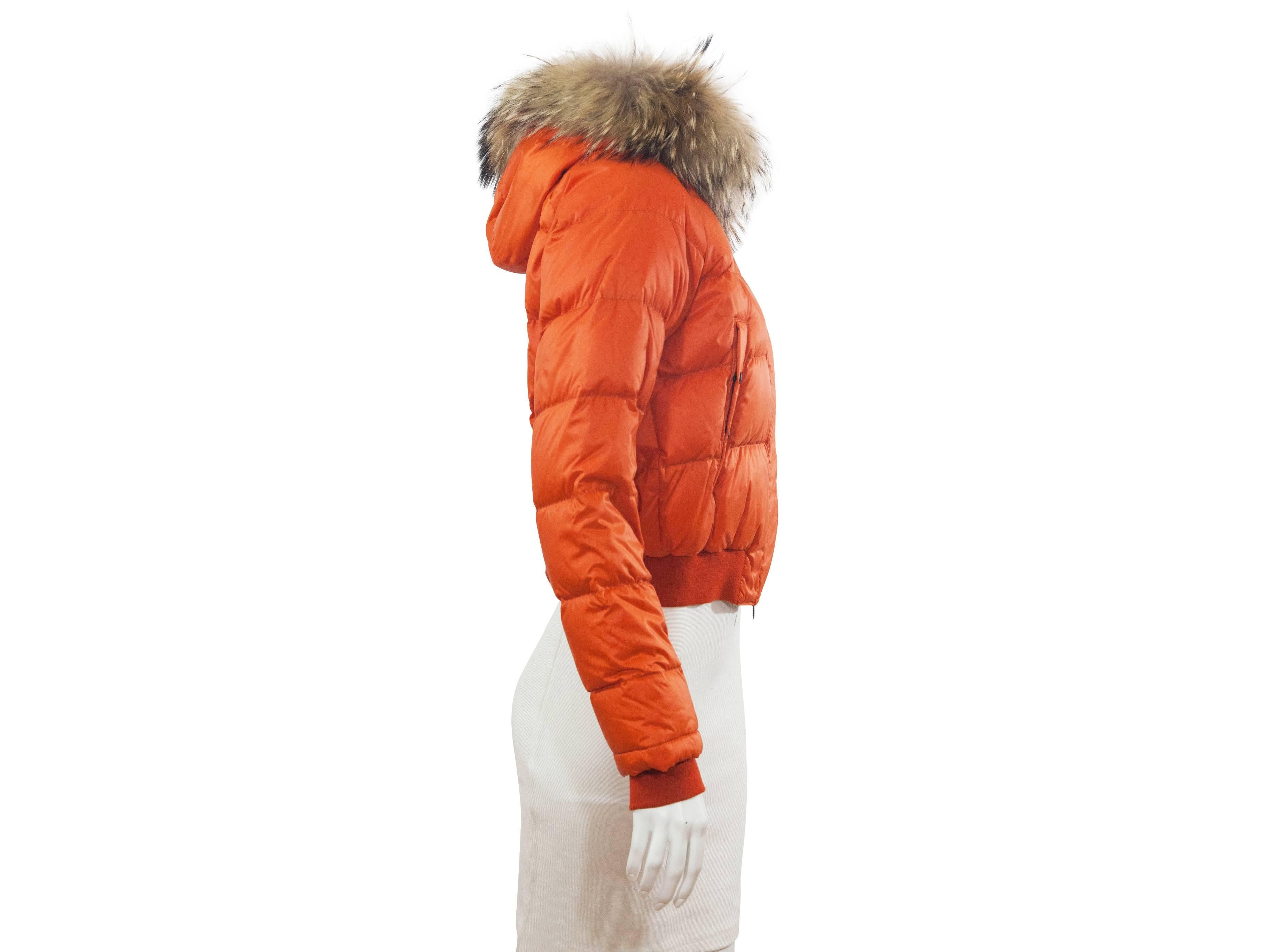 orange coat with fur hood
