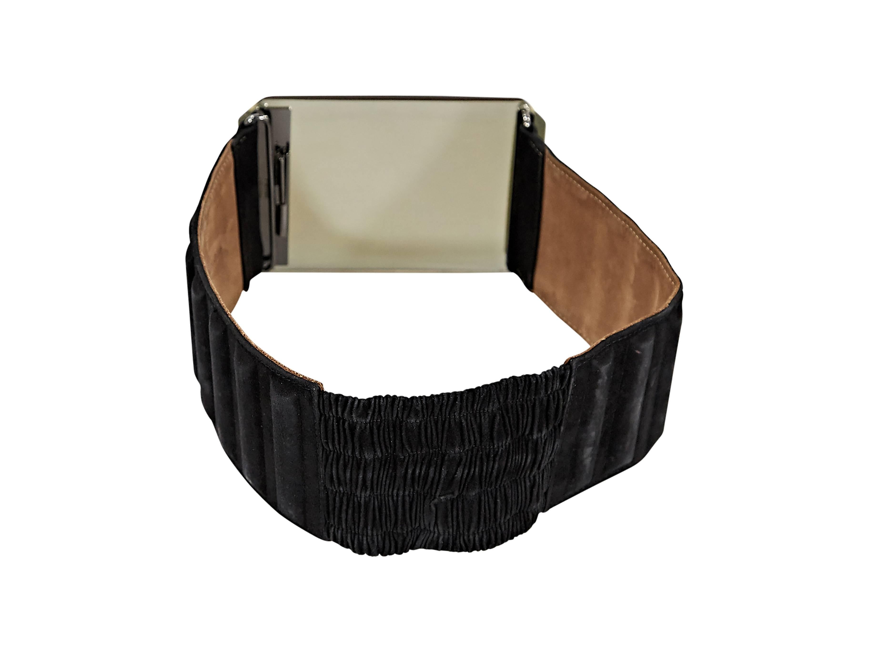 Black suede belt by Fendi.  Raised accents.  Faceted yellow stone buckle with hidden closure.  Inset elastic panel for a stretch fit. 