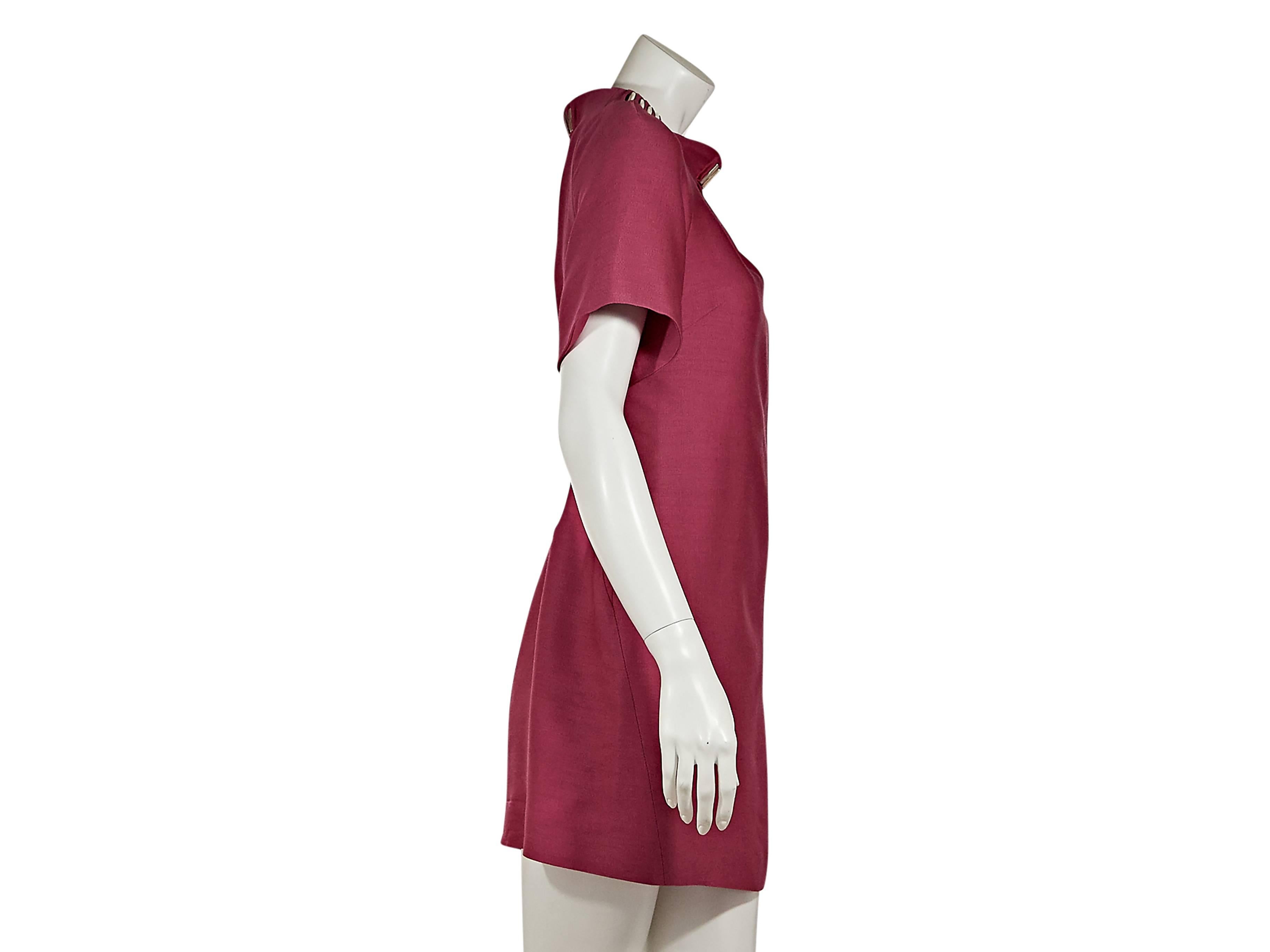 Pink silk and wool blend shift dress by Versace.  Crewneck.  Gathered pleats accent neckline.  Short sleeves.  Cutout back.  
