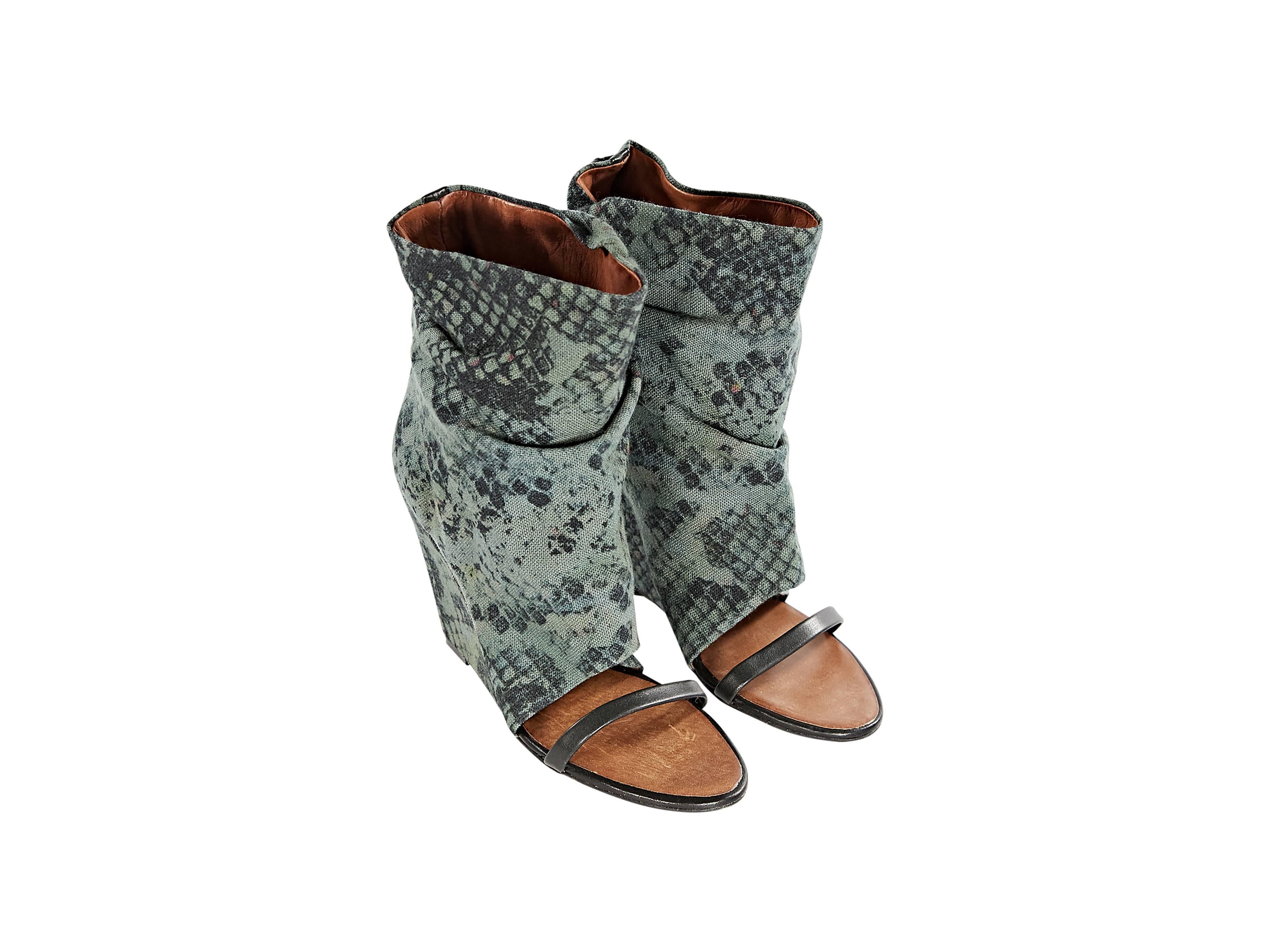 Slouchy canvas ankle boots by Isabel Marant.  Green and black snake-print design. Open toe.  Slip-on style. 