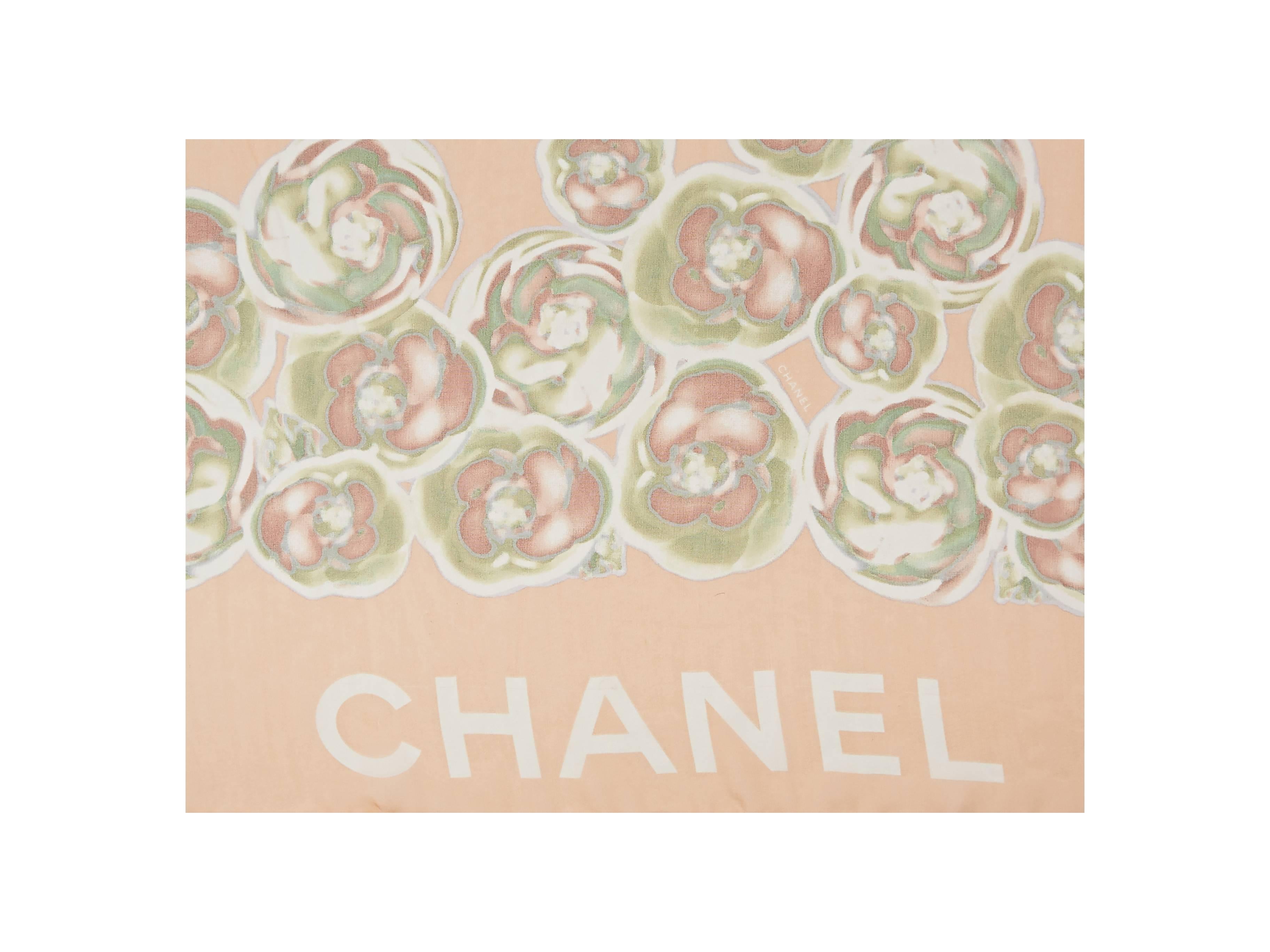 Sheer peach floral-printed scarf by Chanel.  Approximately 25