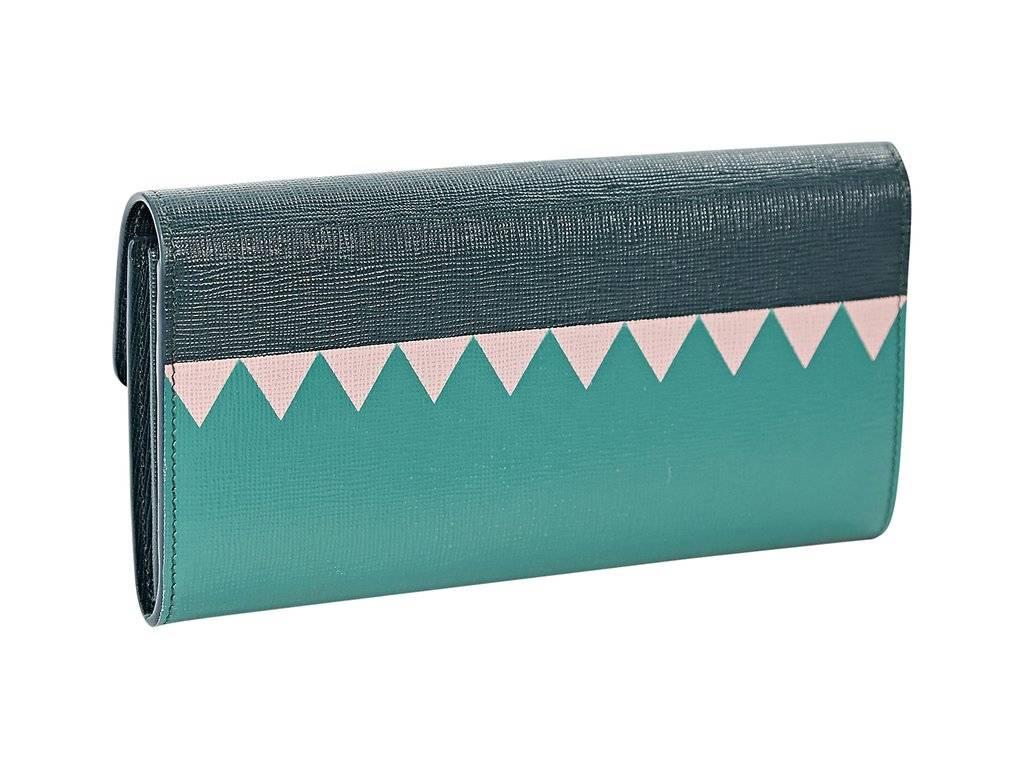 Product details:  ﻿﻿Multicolor leather Monster wallet by Fendi.  Accented with a crystal tooth detail.  Snap flap closure.  Two bill compartments and center zip coin pouch.  7