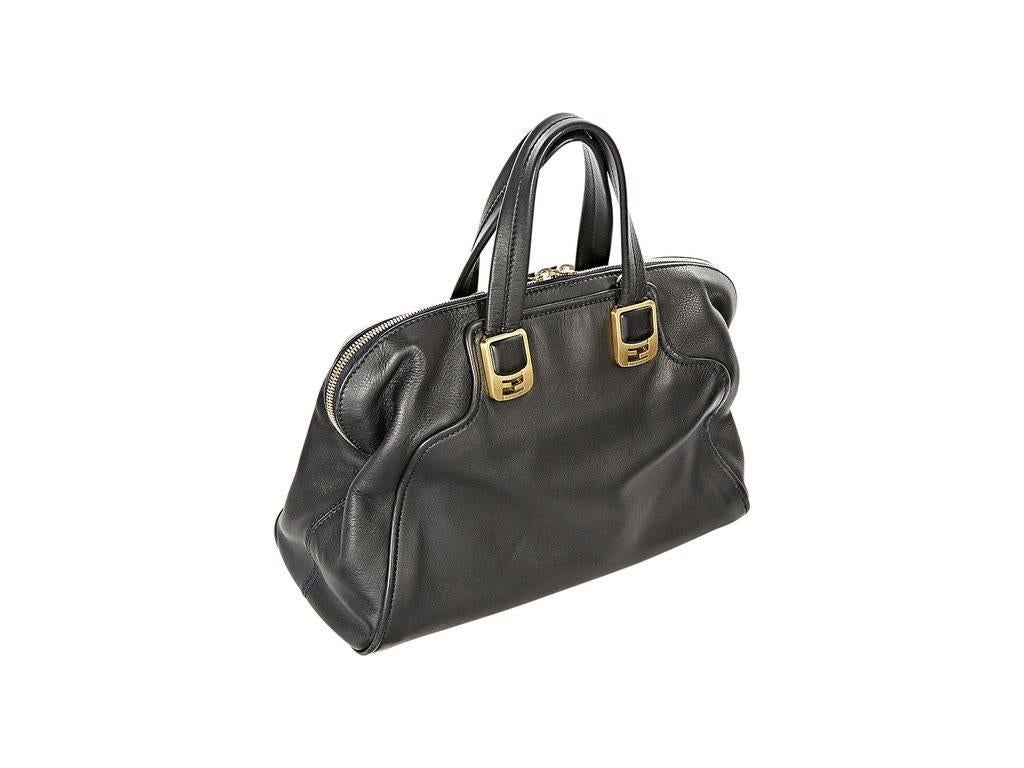 Product details:  Black leather Chameleon satchel by Fendi.  Top carry handles.  Detachable crossbody strap.  Lined interior with inner zip and slide pockets.  Flat bottom with protective metal feet.  Goldtone hardware.  11
