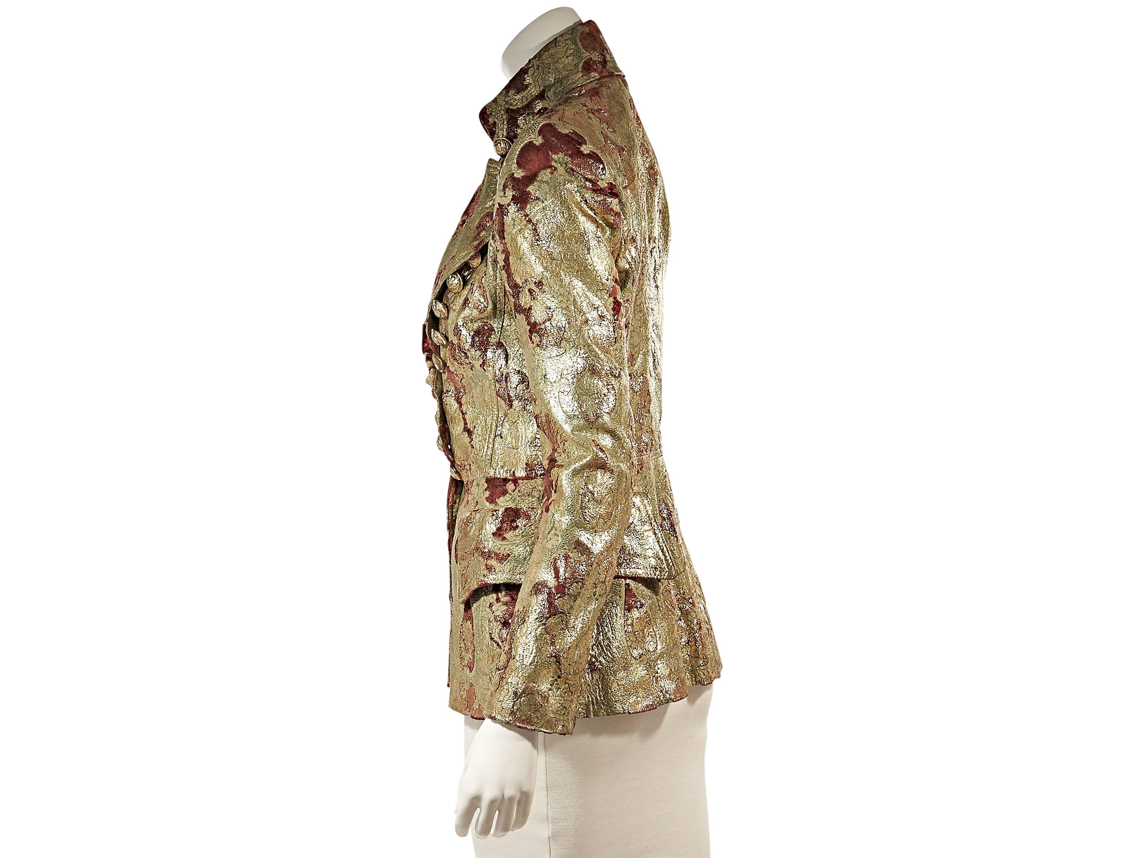 Product details:  Metallic gold and red brocade jacket by Balmain.  From the runway.  Military-inspired jacket.  Button-down lapel.  Long sleeves.  Double-breasted button front.  Front and back flap waist pockets.  Goldtone hardware.﻿
Condition: