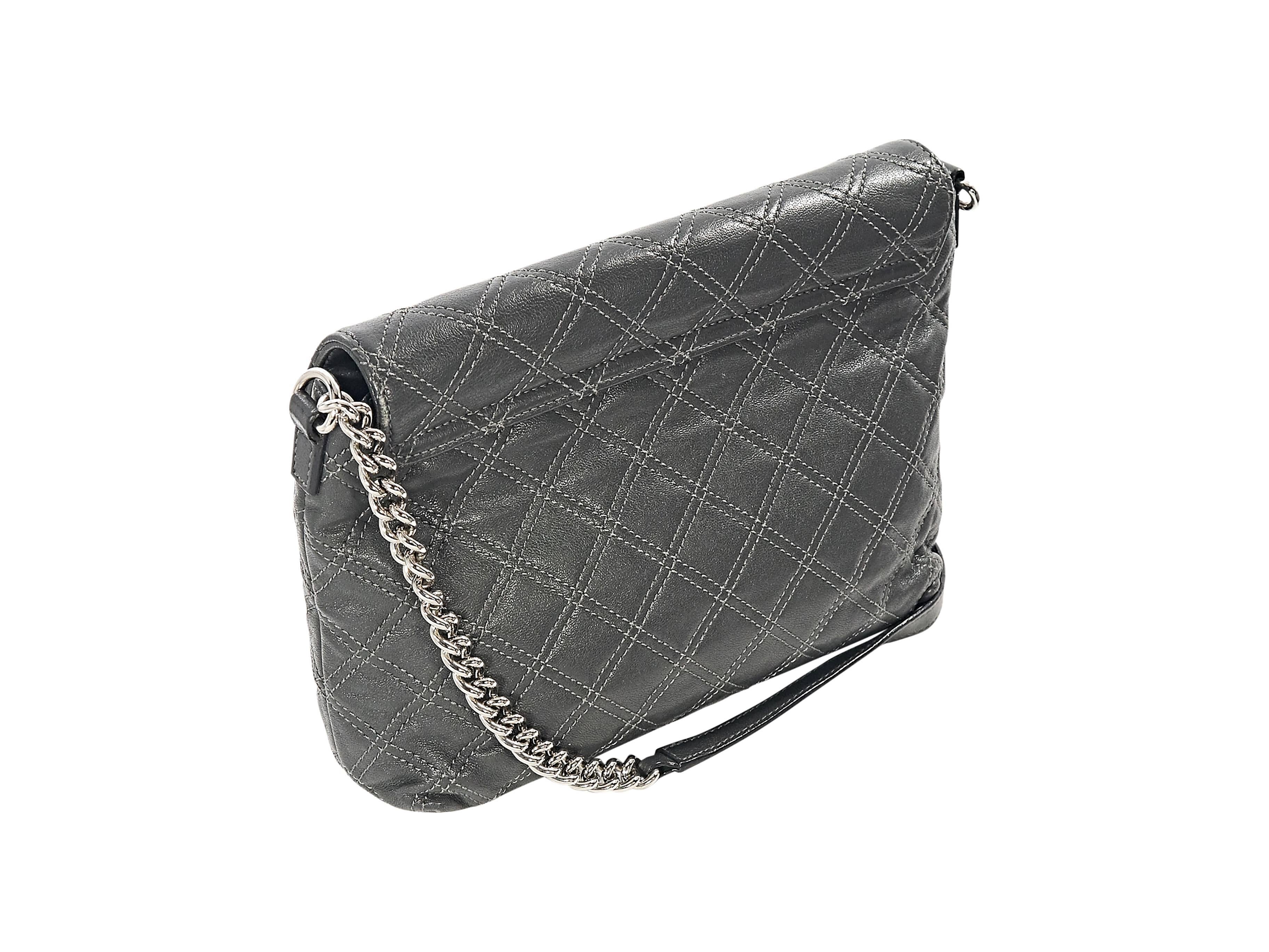 Product details:  ﻿Grey quilted leather shoulder bag by Marc Jacobs.  Leather and chain shoulder strap.  Front flap accented with a faux lock.  Lined interior with inner zip pocket and two slide pockets.  Silvertone hardware.  Dust bag included. 