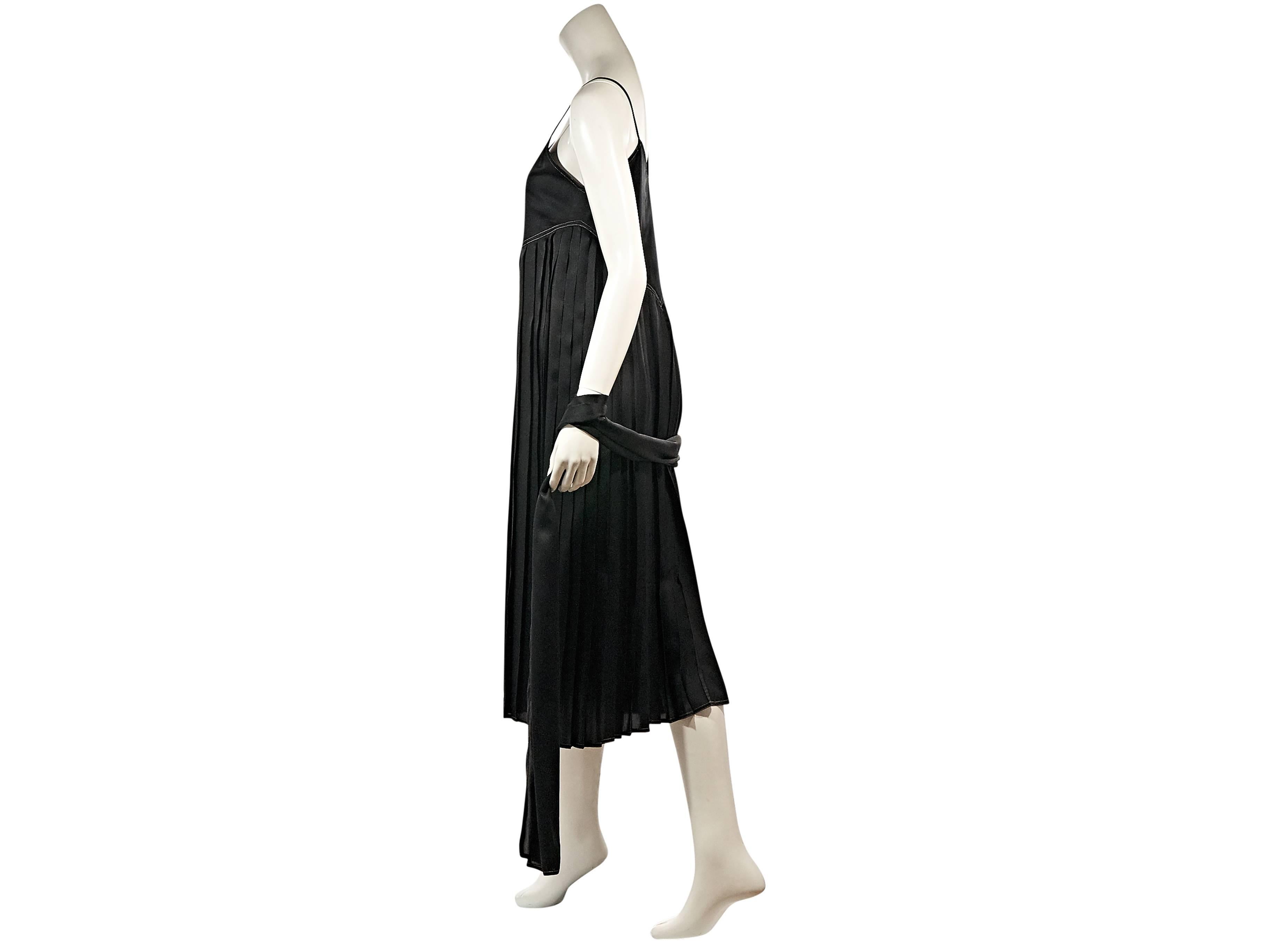 Product details:  Black silk box pleated slip dress by Gucci.  Shawl included.  Sleeveless.  Spaghetti straps.  Pullover style. ﻿
Condition: Excellent. 