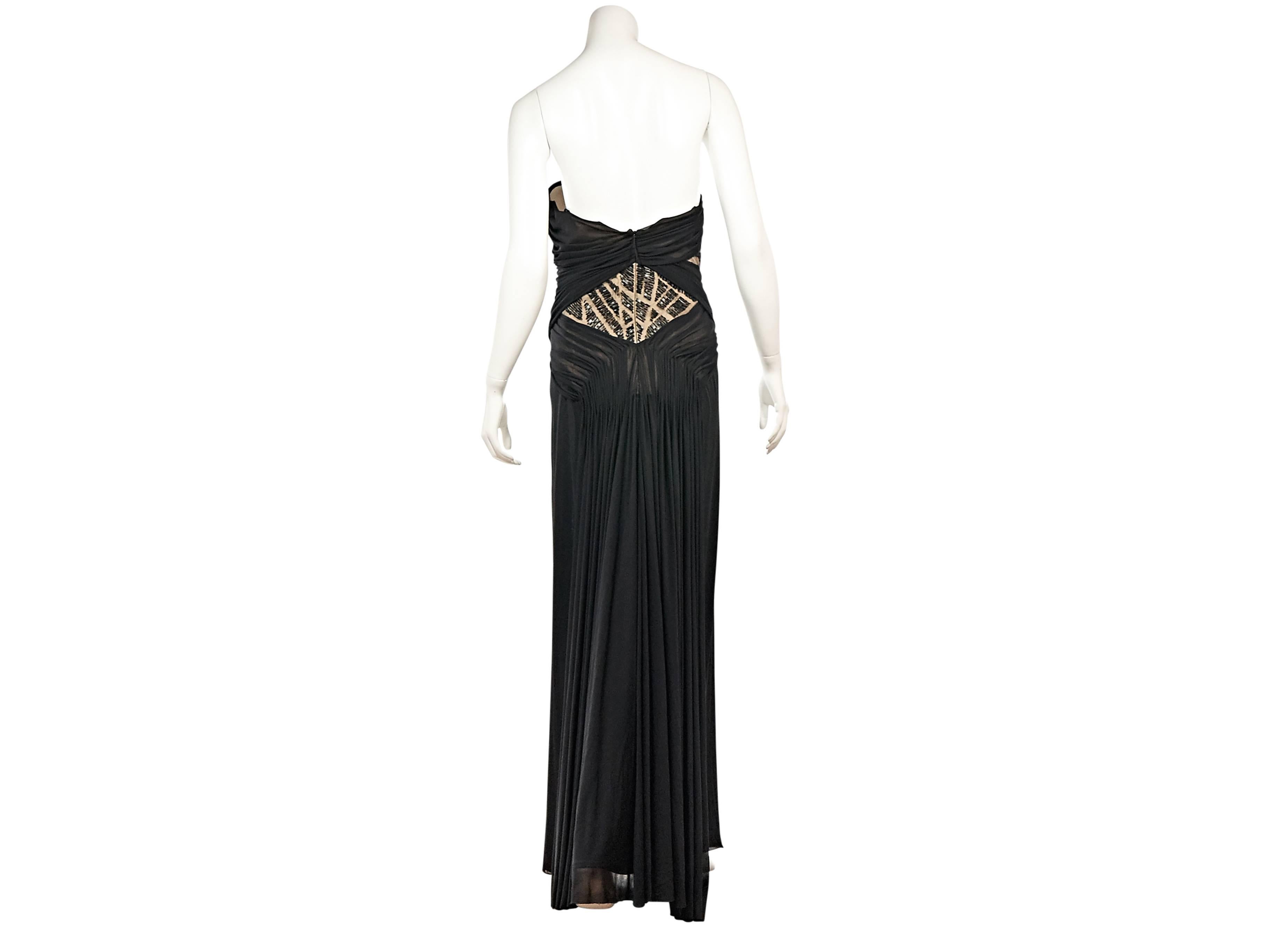 Product details:  ﻿Black strapless gown by J. Mendel.  Accented with beads.  Sweetheart neckline.  Gathered ruching for a flattering silhouette.  Concealed back zip closure. 
Condition: Excellent. 