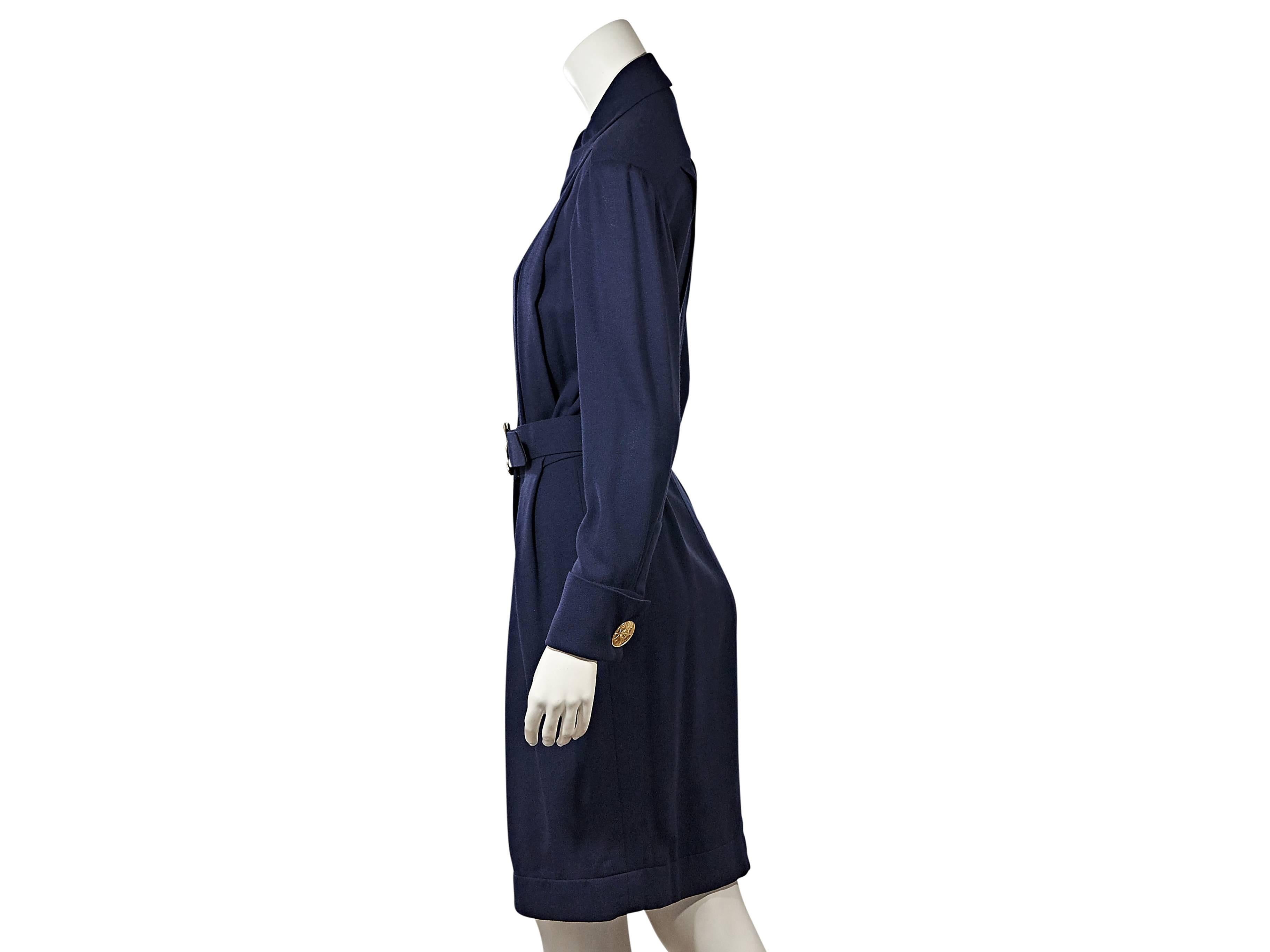 Product details:  ﻿Vintage navy pleated dress by Chanel.  Spread collar.  Long sleeves.  French cuffs.  Button-front closure.  Adjustable belted waist.  
Condition: Very good. 