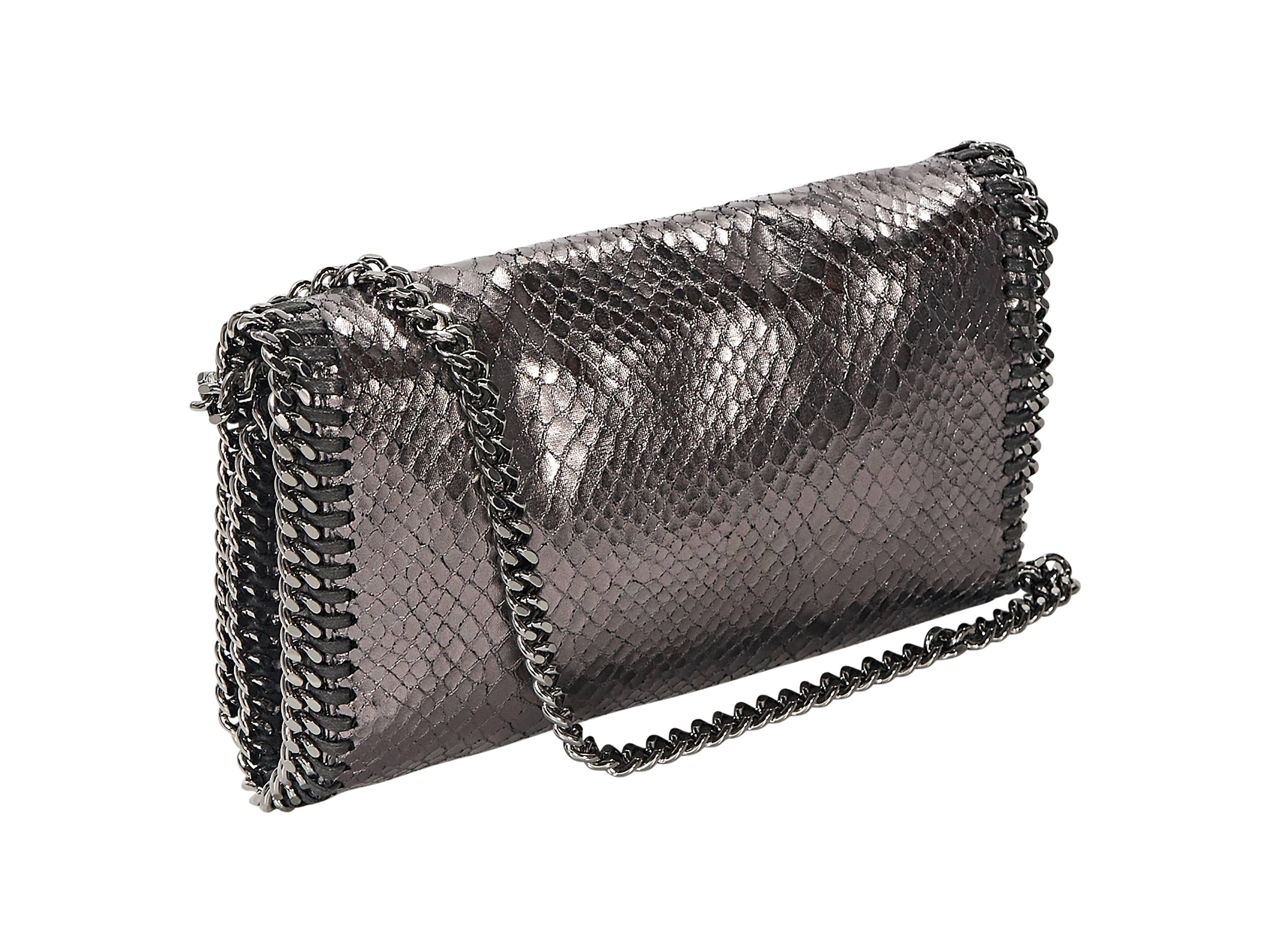 Product details:  ﻿Bronze embossed Falabella crossbody bag by Stella McCartney.  Chain crossbody strap.  Front flap.  Lined interior.  Silvertone hardware.  8.5