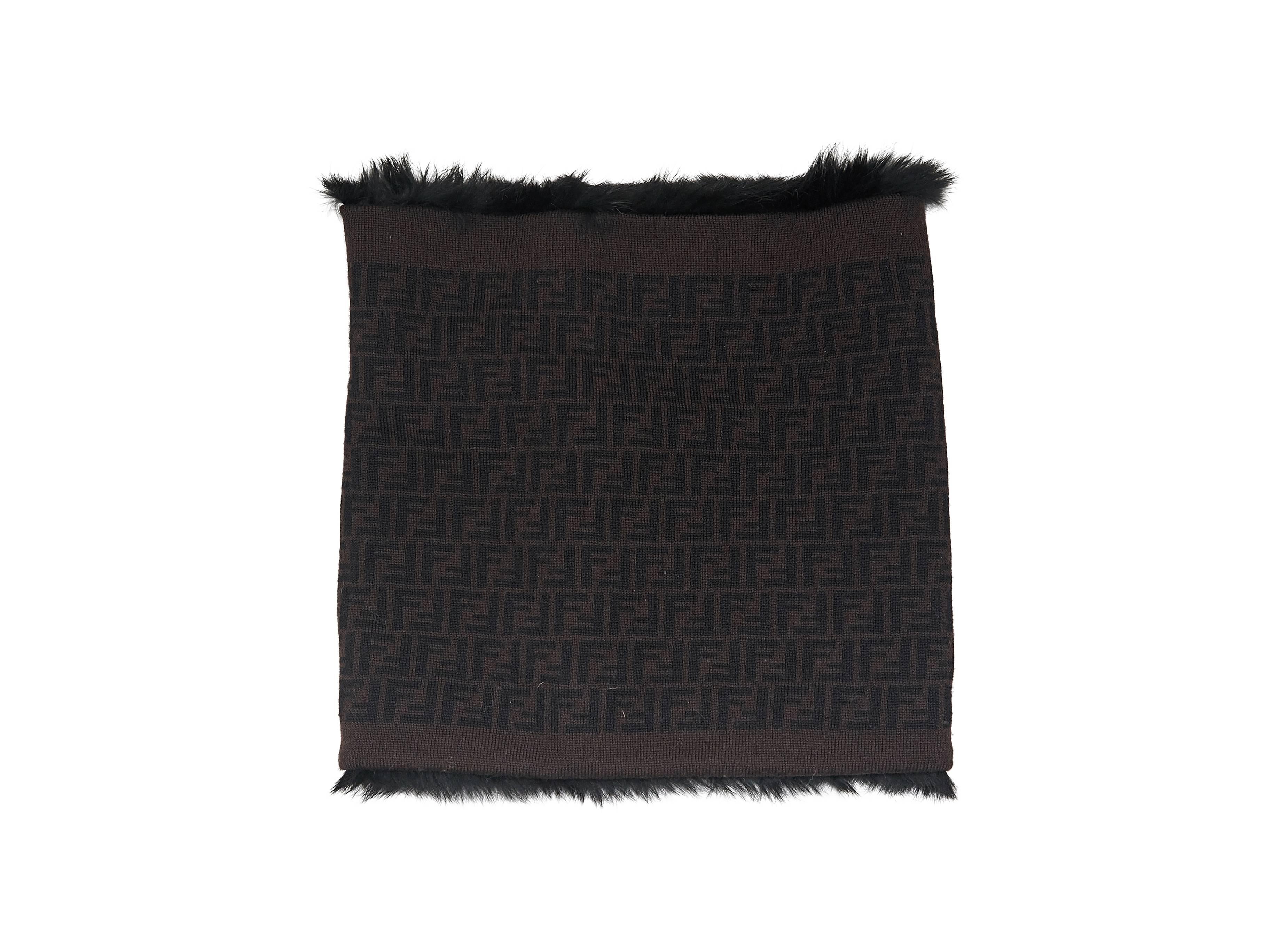 Product details: Black infinity scarf by Fendi. Detailed with Zucca logo. Fur lining. 
Condition: Excellent. 
Est. Retail $ 1,300.00