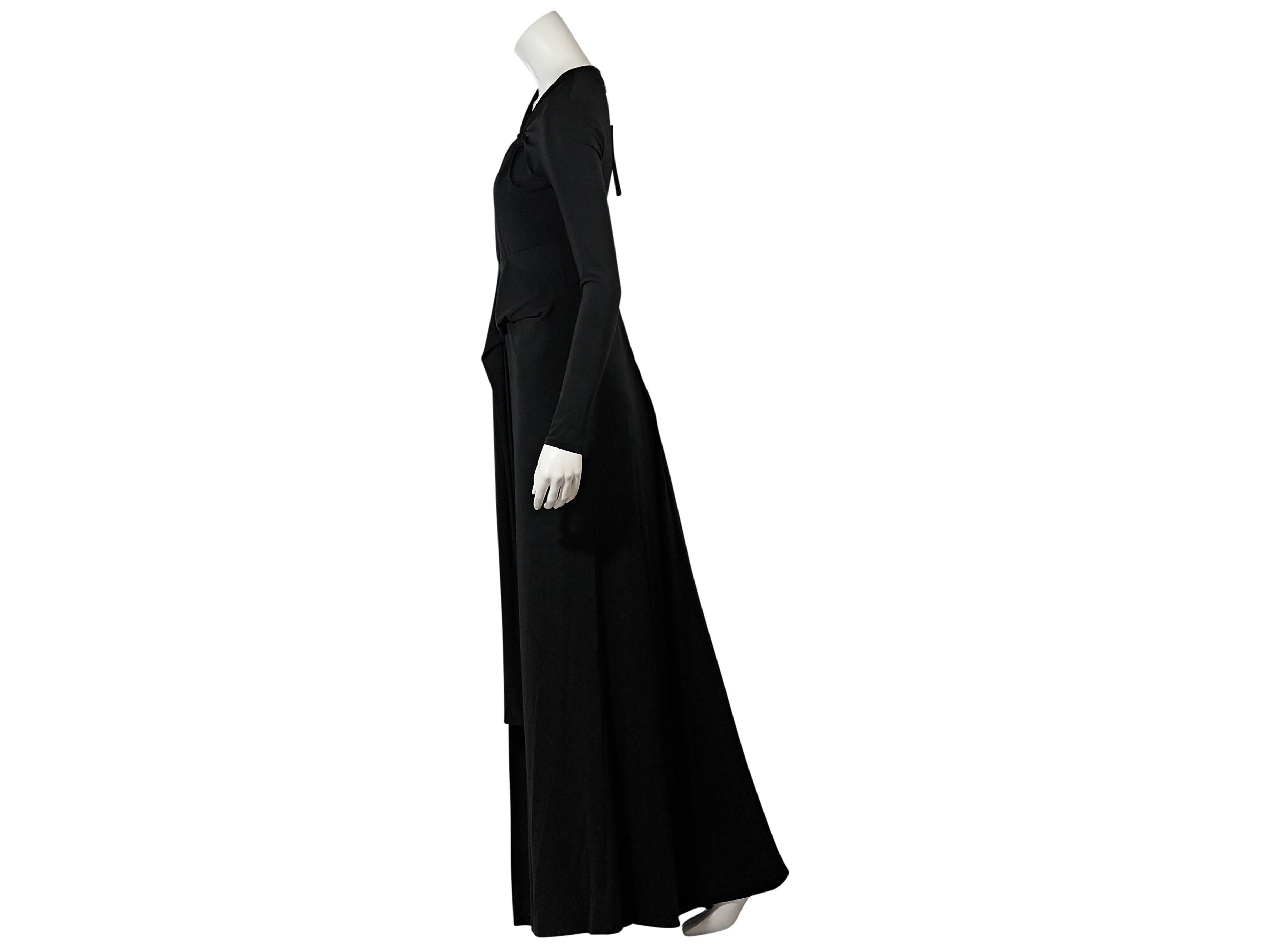 Product details:  Black long-sleeve gown by Halston Heritage.  Deep slit neck.  Long sleeves.  Gathered front details.  Concealed back zip closure.    
Condition: New with tags. 
Est. Retail $ 495.00