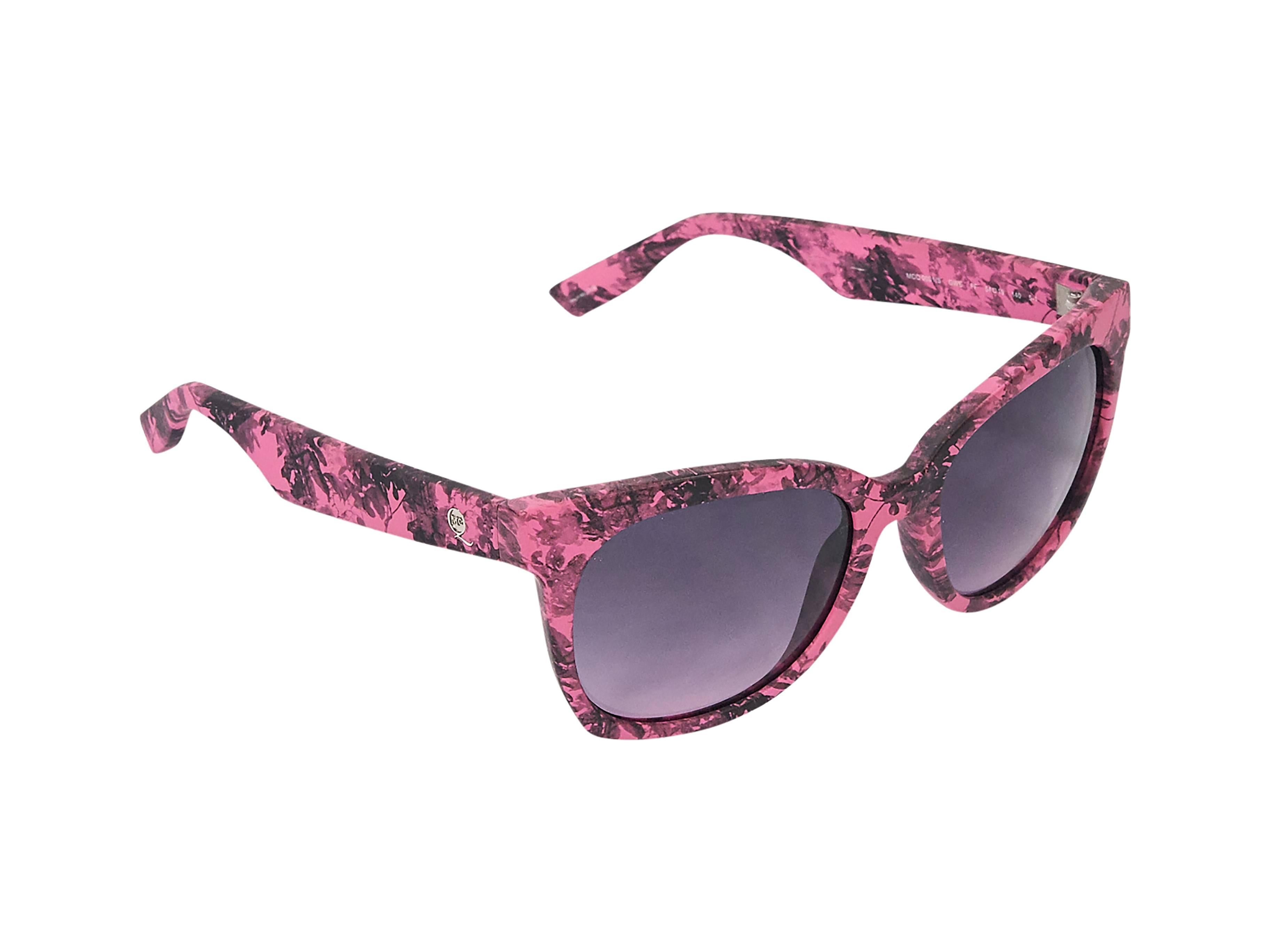 Product details: Matte pink and black floral printed sunglasses by Alexander McQueen. Gradient lenses. 
Condition: Excellent. 
Est. Retail $ 470.00