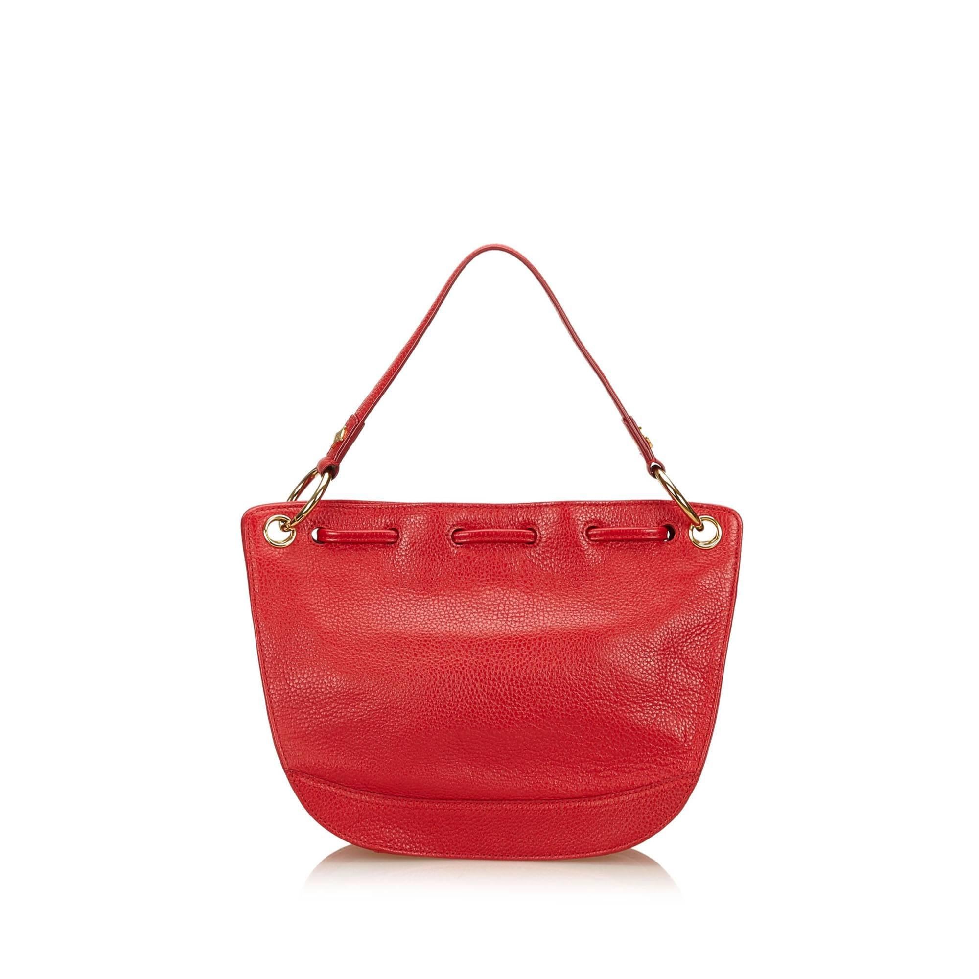 red mcm bag