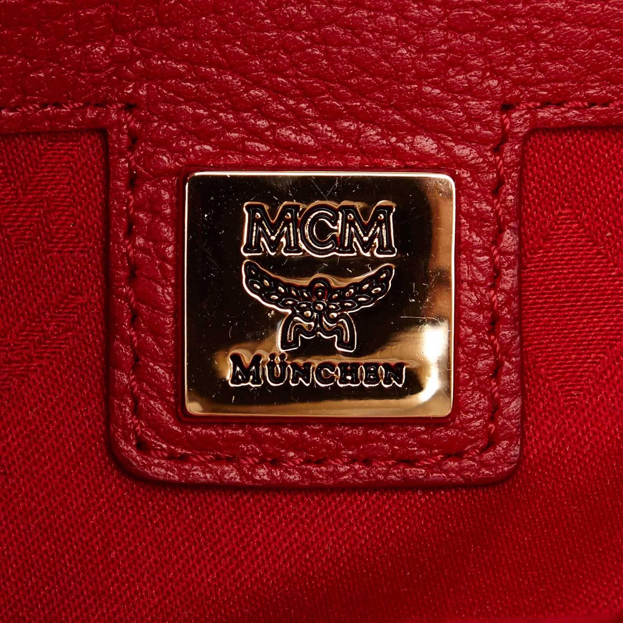 red mcm handbag