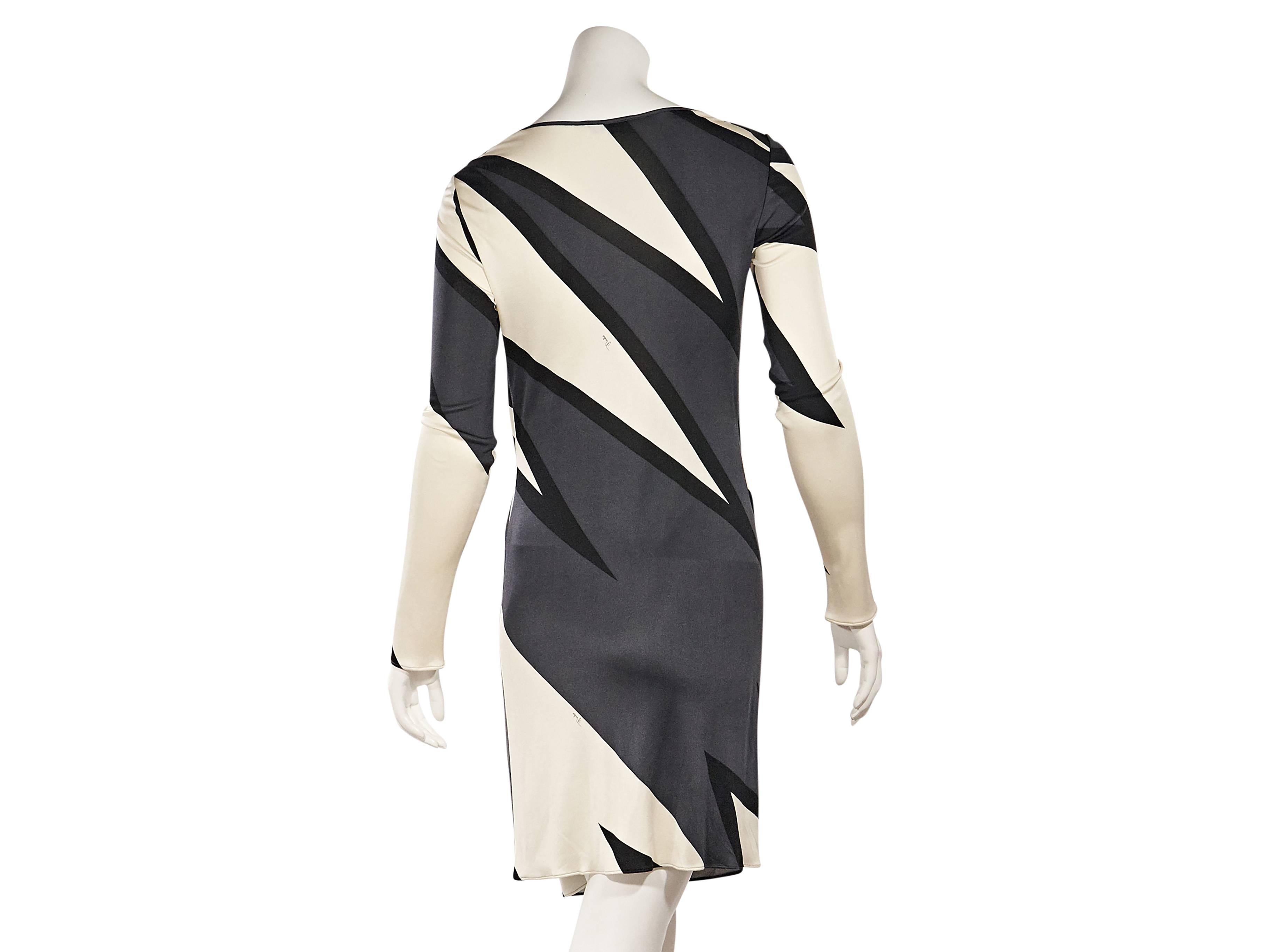 Product details:  Grey and ivory printed faux wrap dress by Emilio Pucci.  V-neck.  Long sleeves.  Gathered at hips.  Pullover style.   
Condition: Excellent. 
Est. Retail $ 430.00