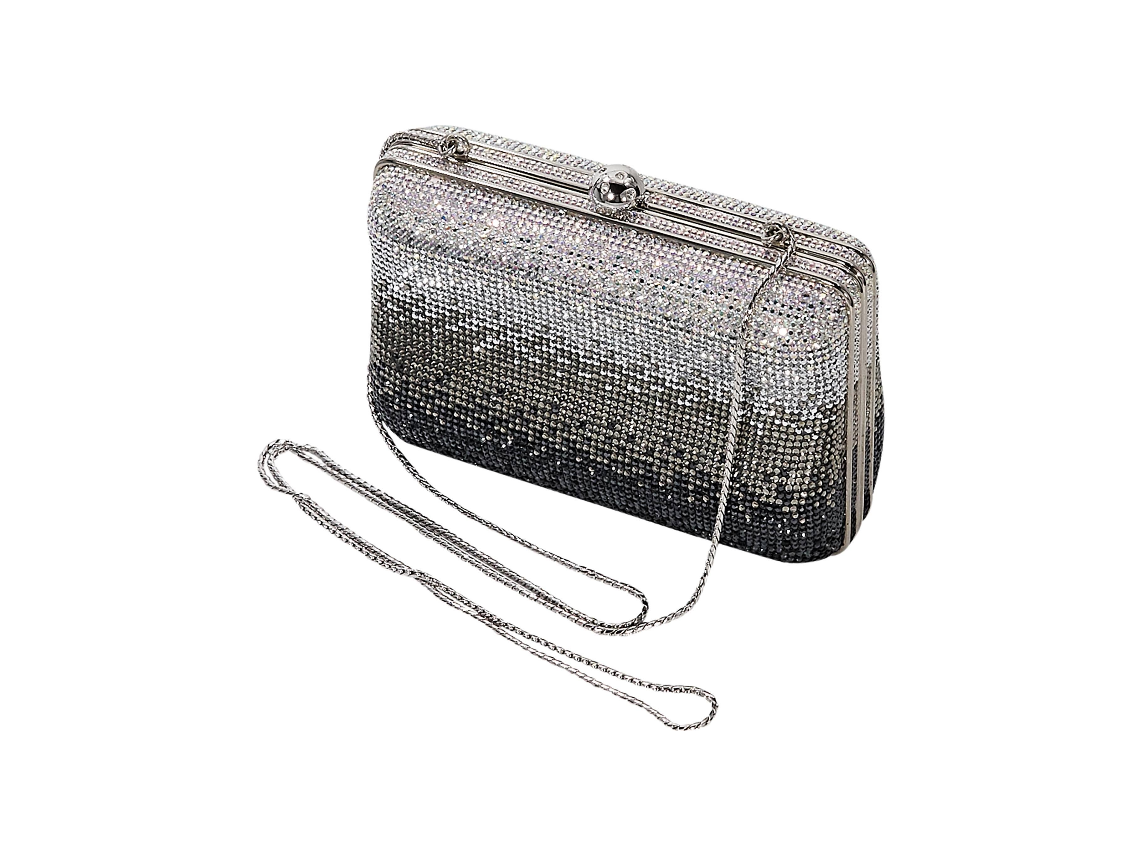 Product details: Silver and black ombre sequin clutch by Judith Leiber. Tuck-away shoulder strap. Top push-lock closure. Lined interior. Silvertone hardware. Accessories included. 
Condition: Very good. 
Est. Retail $ 880.00