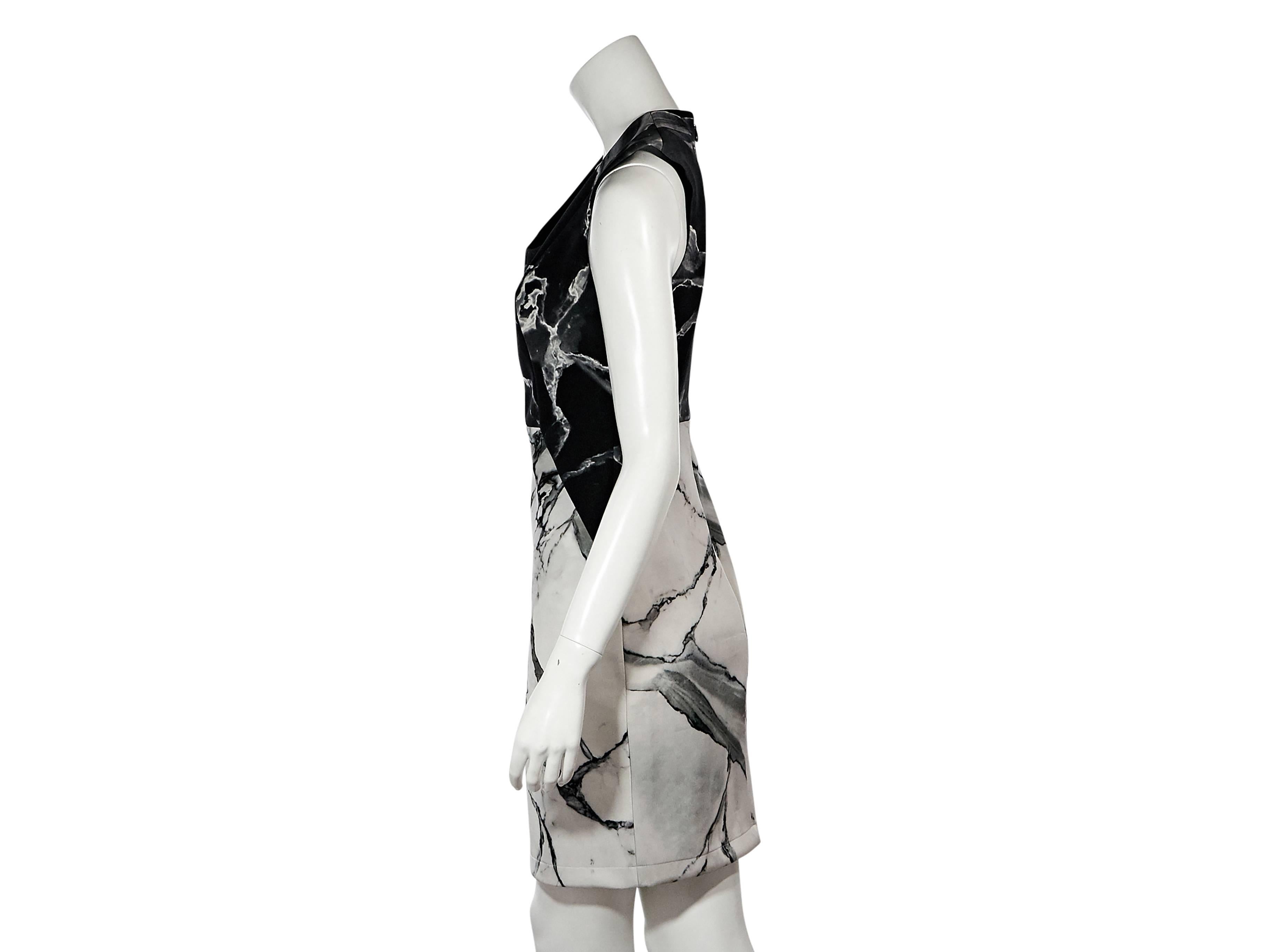 Product details: Black and white marble-printed silk sheath dress by Robert Rodriguez. Flattering design. U-neck. Sleeveless. Concealed back zip closure. 
Condition: Very good. 
Est. Retail $ 370.00