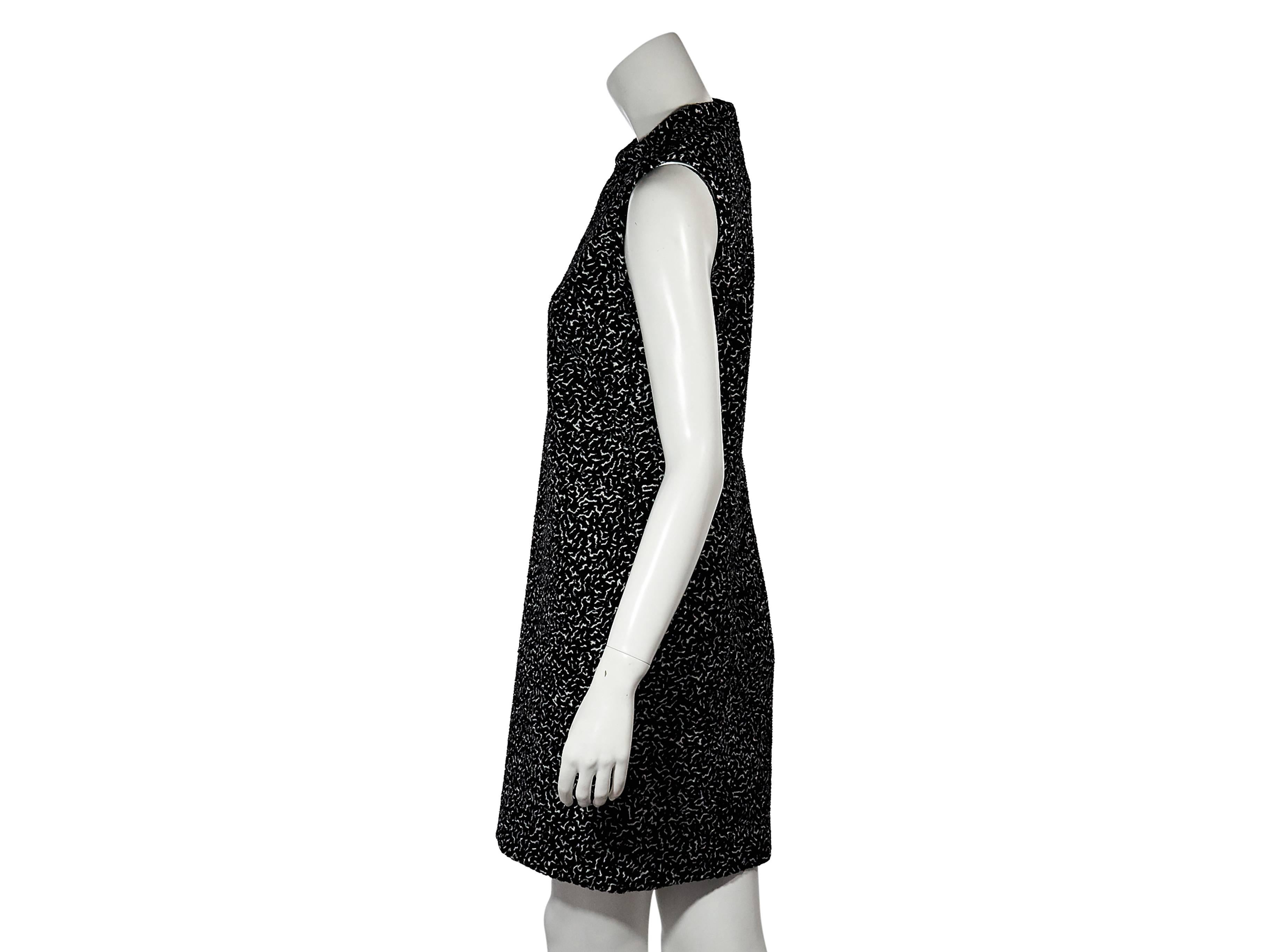 Product details: Black and white printed shift dress by Proenza Schouler. Crewneck. Sleeveless. Concealed back zip closure. 
Condition: New with tags. 
Est. Retail $ 2,980.00