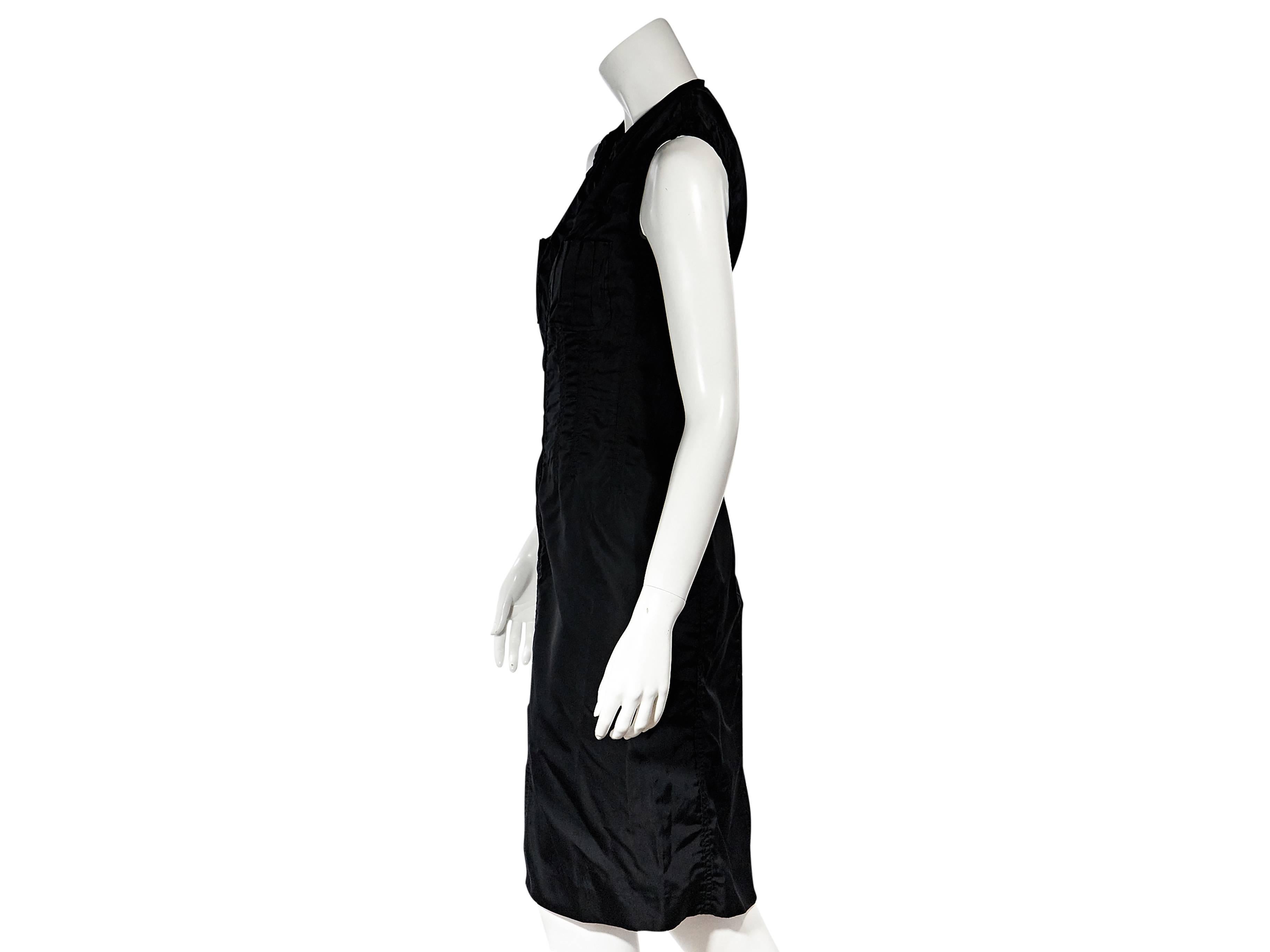 Product details: Black silk sheath dress by Yves Saint Laurent. Crewneck. Sleeveless. Concealed hook front closure. Front hem slit. Label size FR 38. 
Condition: Very good. 
Est. Retail $ 580.00