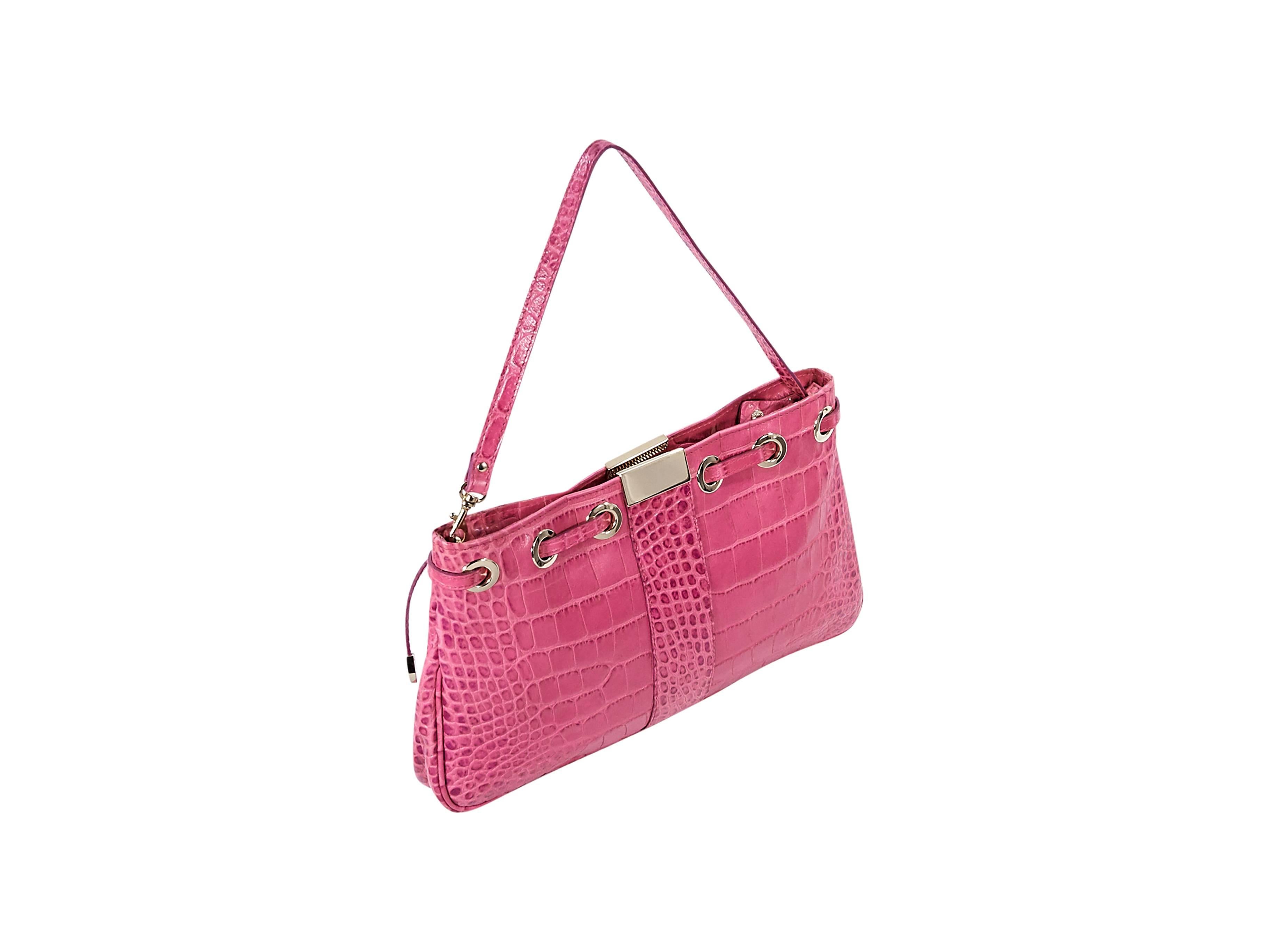 Product details:  Pink embossed leather small shoulder bag by Jimmy Choo.  Woven drawstring detail.  Top zip closure.  Lined interior with inner zip and slide pockets.  Goldtone hardware. Authenticity card included.  13