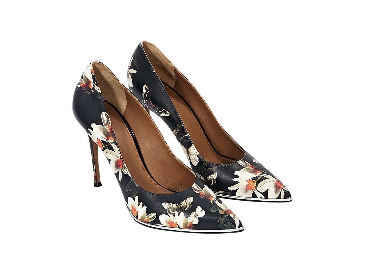 Product details:  Multicolor floral-printed leather pumps by Givenchy.  Point toe.  Slip-on style.  Shoe bags included. 
Condition: Very good.
Est. Retail $ 998.00