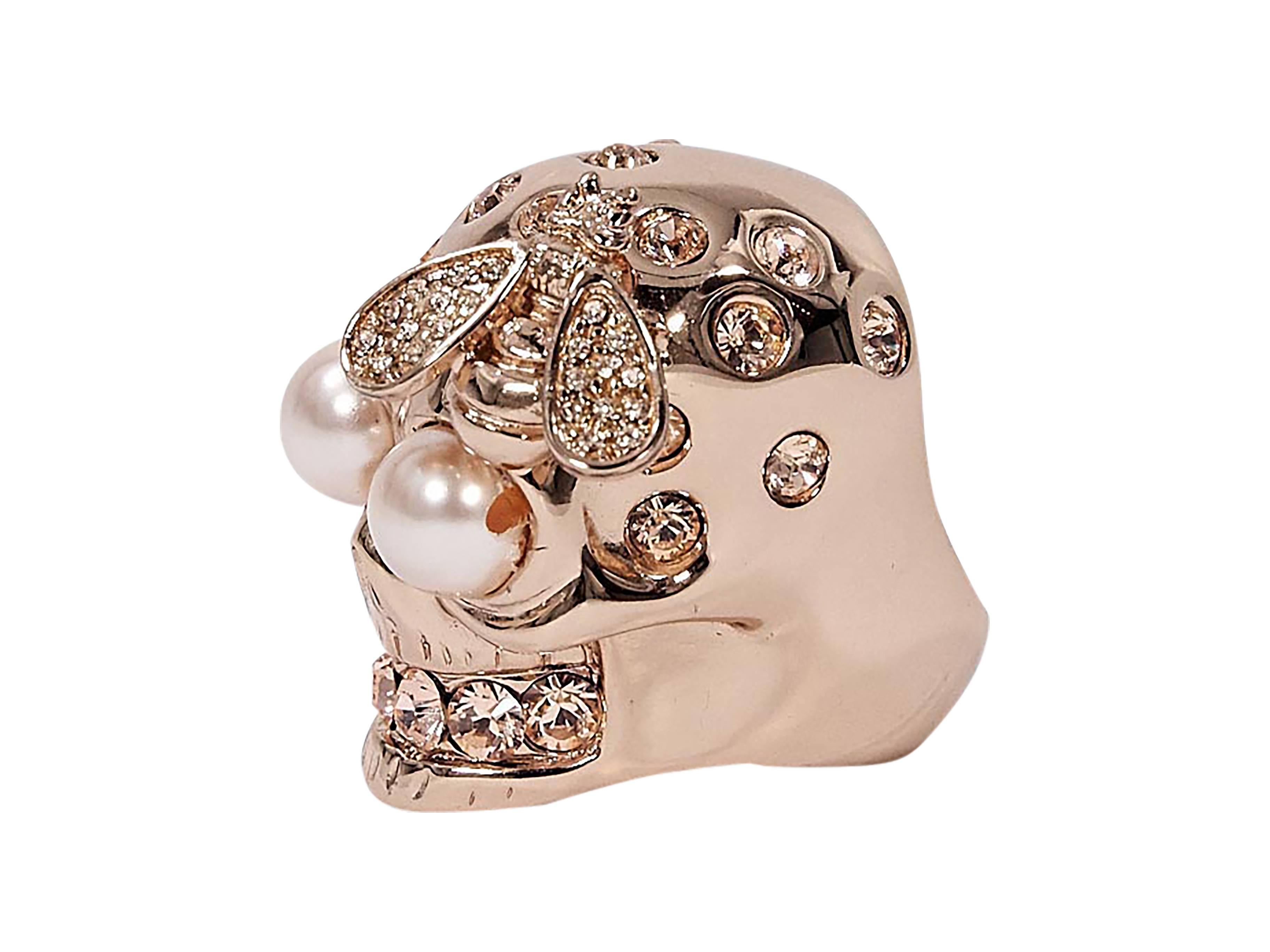 Product details:  Rose gold-tone skull and bee cocktail ring by Alexander McQueen.  Embellished design. 
Condition: Pre-owned. Very good.

Size 4.5 

Est. Retail $ 445.00
