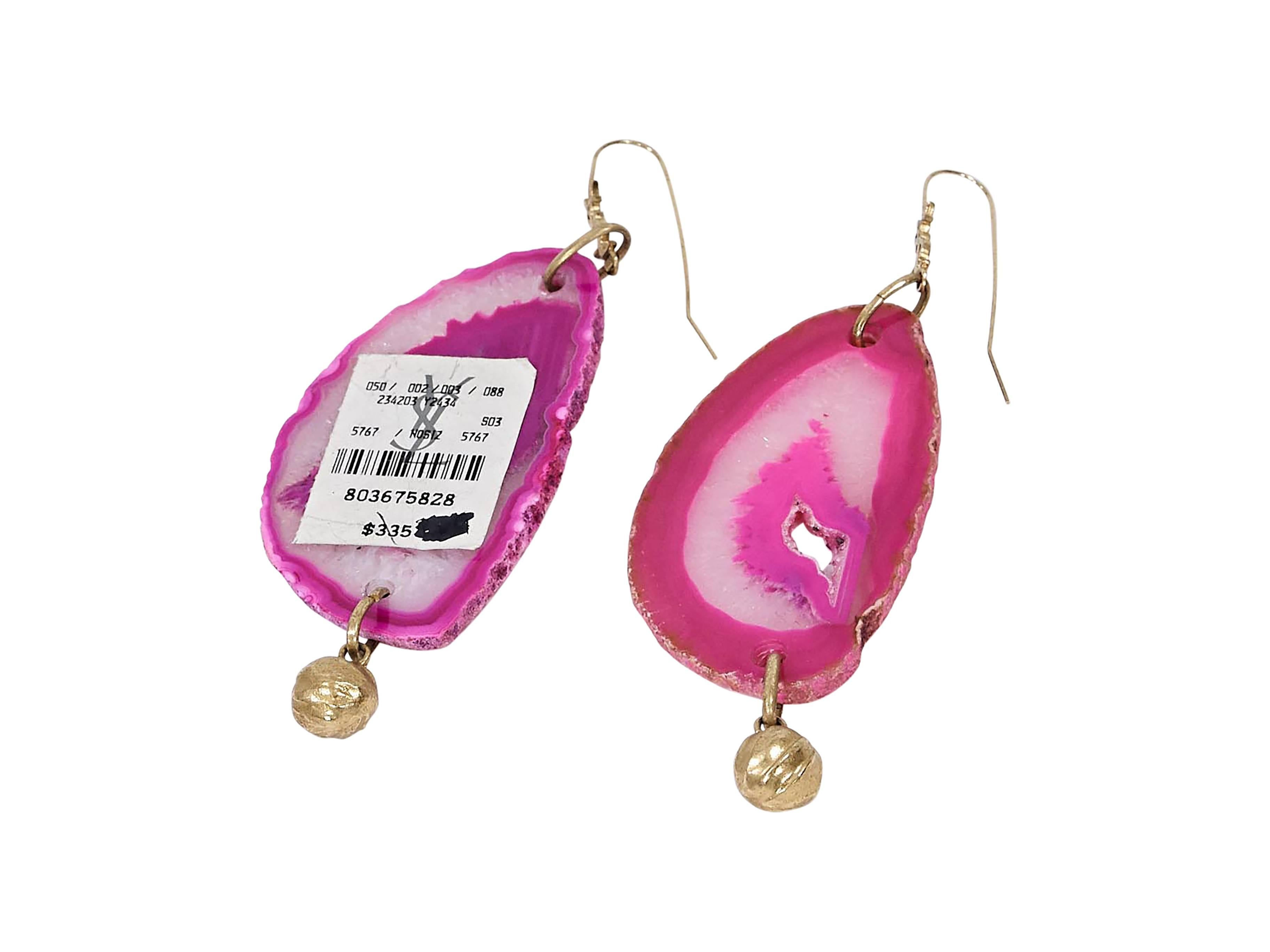 Product details:  Pink agate drop earrings by Yves Saint Laurent.  Accented with a ball charm.  Hook backings.  Goldtone hardware.  4.5