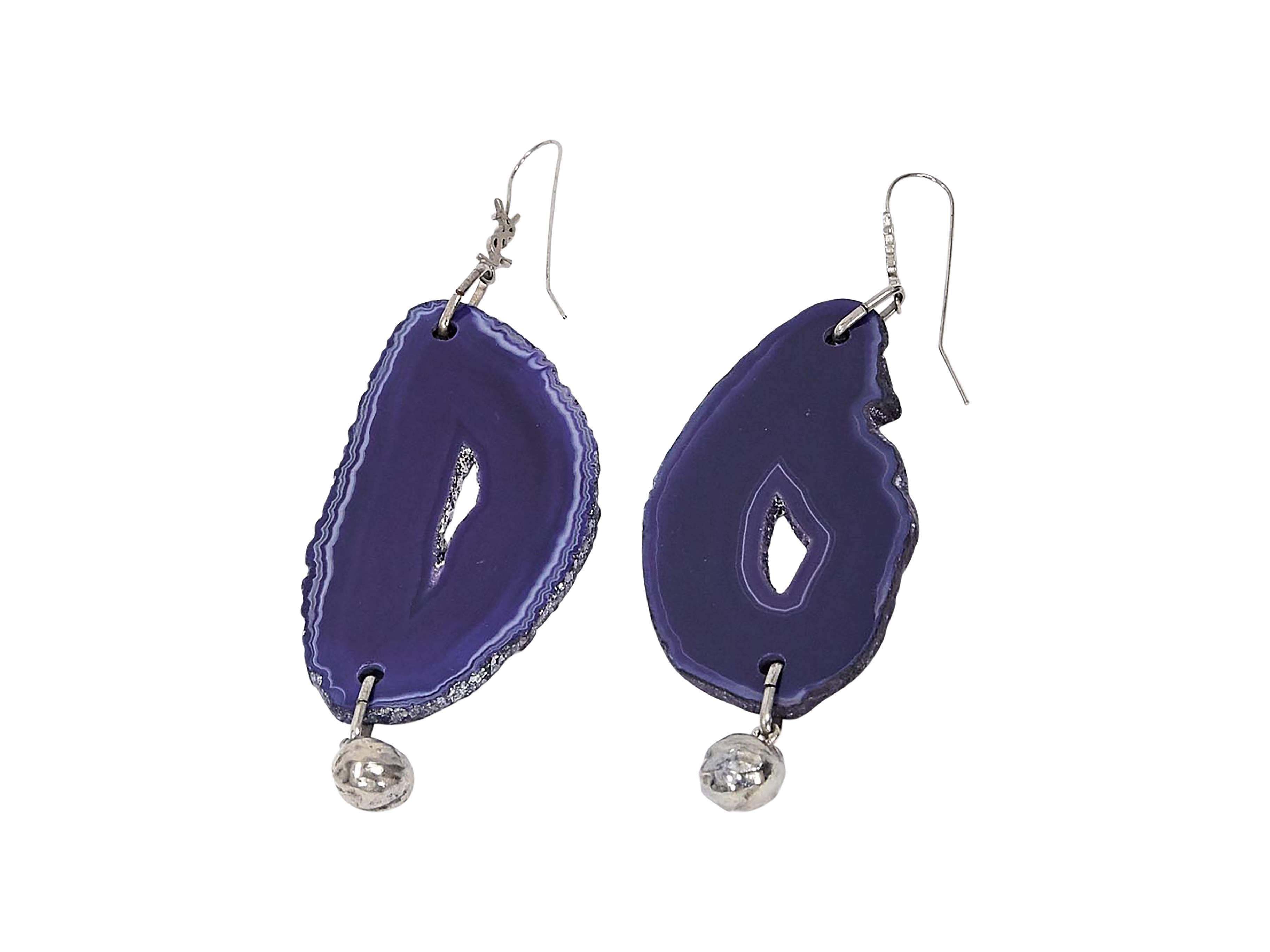 Product details:  Purple agate drop earrings by Yves Saint Laurent.  Accented with a ball charm.  Hook backing.  Silvertone hardware.  4.5