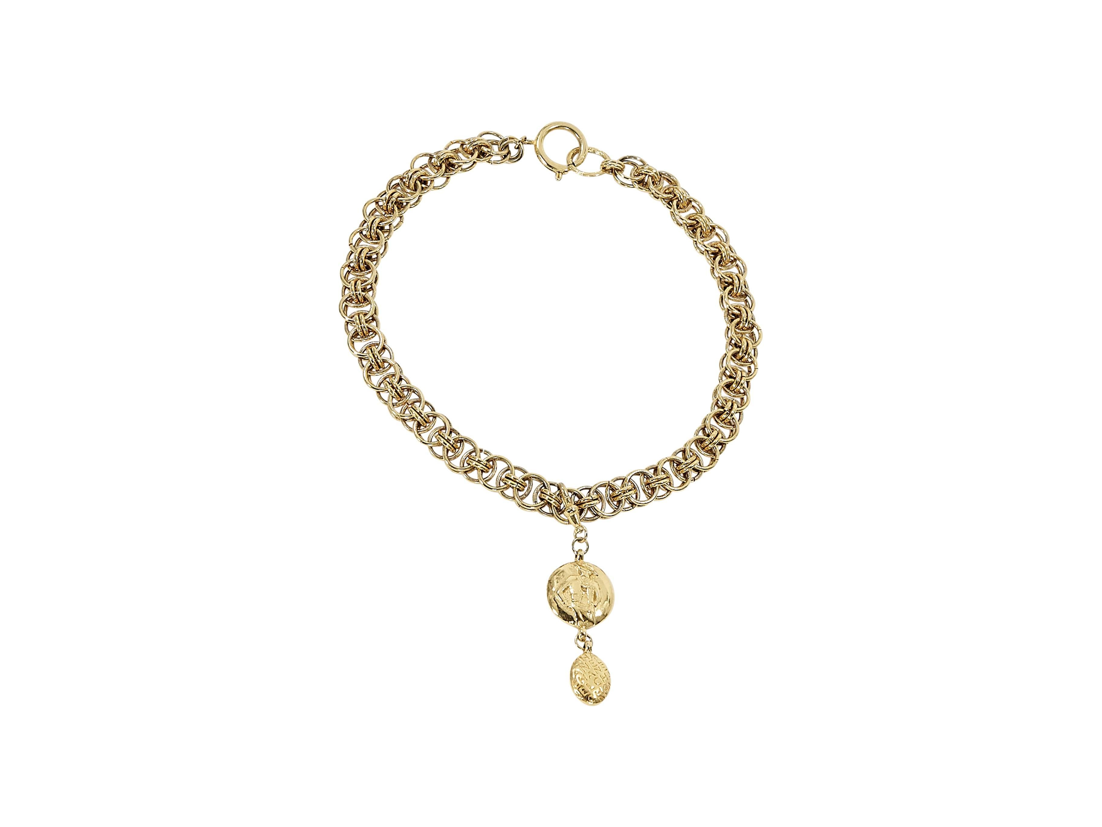 Product details:  Vintage goldtone pendant necklace by Chanel.  Spring ring closure.  16.5