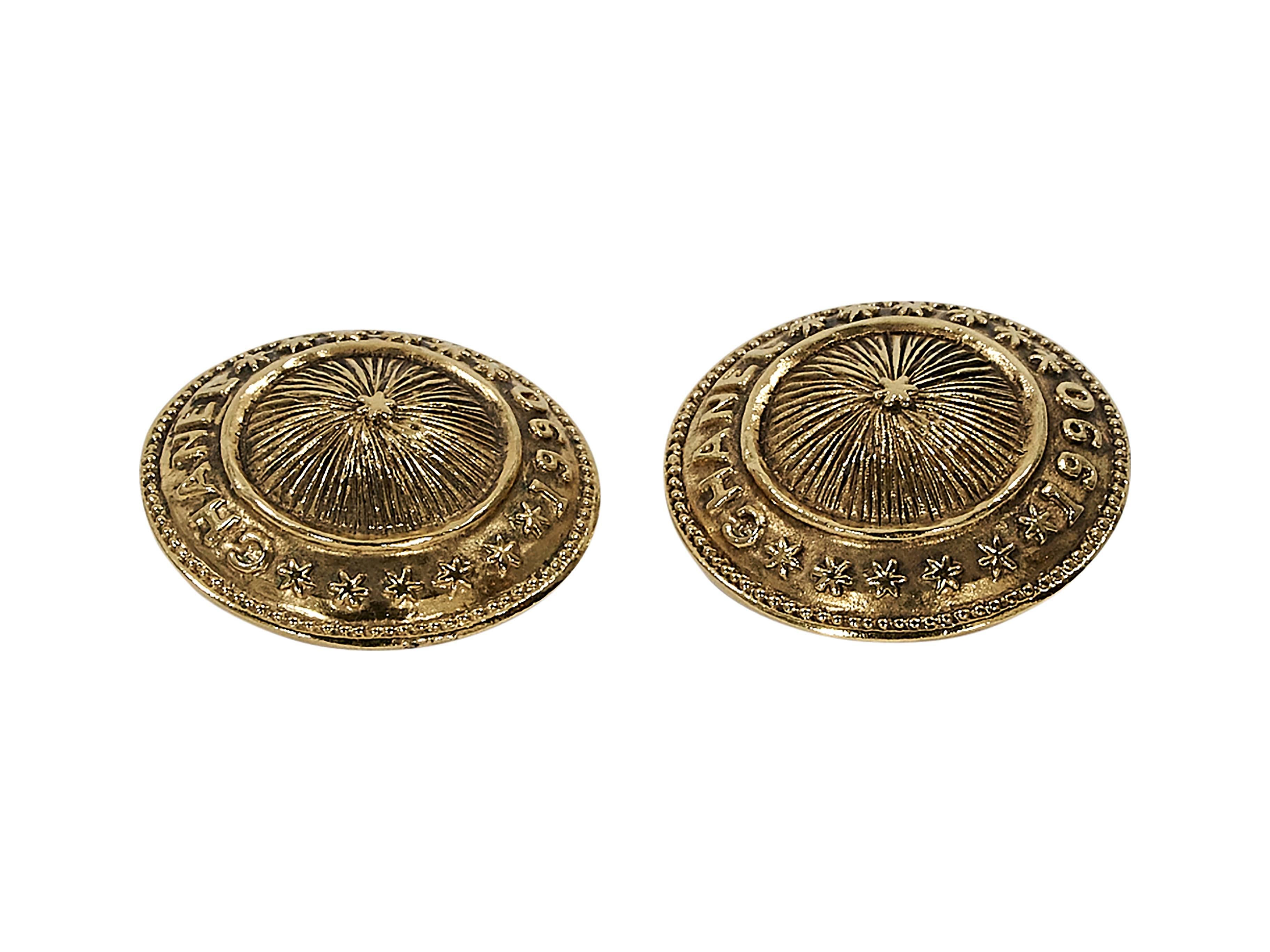 Product details:  Vintage goldtone 1990 earrings by Chanel.  Clip-on backings.  1.25