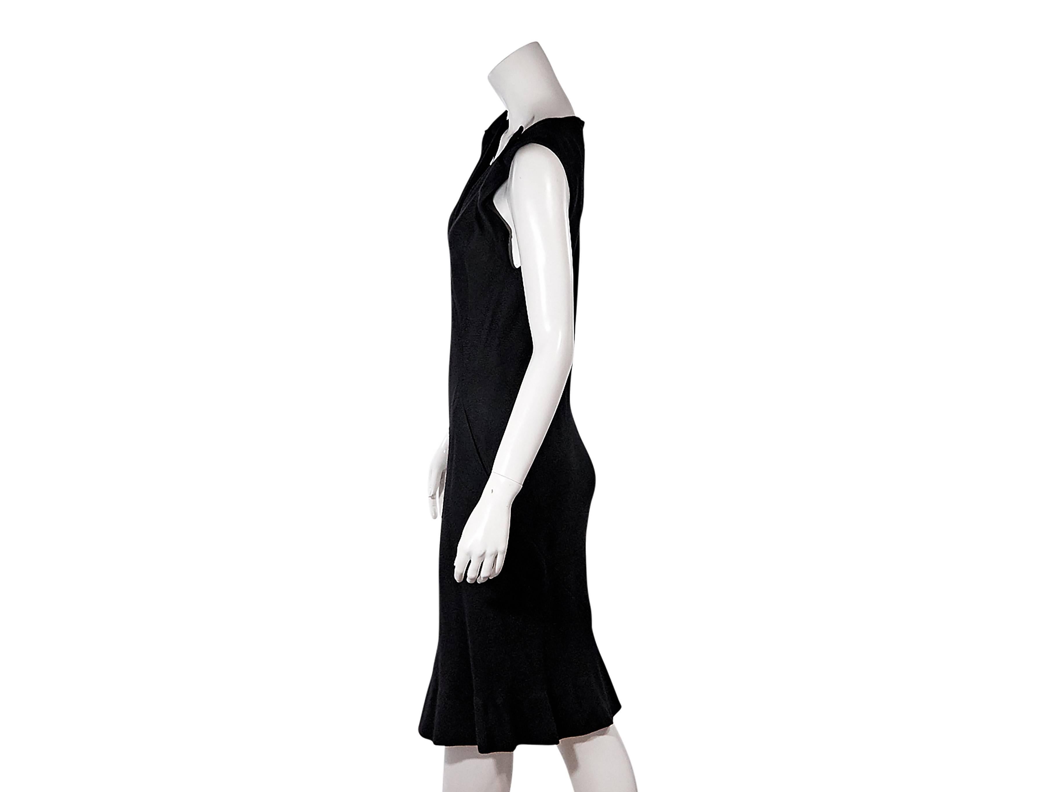 Product details:  Black knit sheath dress by Balenciaga.  Deep v-neck.  Sleeveless.  Pullover style.  Subtle ruffle hem. Size 8
Condition: Pre-owned. New with tags.

Est. Retail $ 1,498.00

