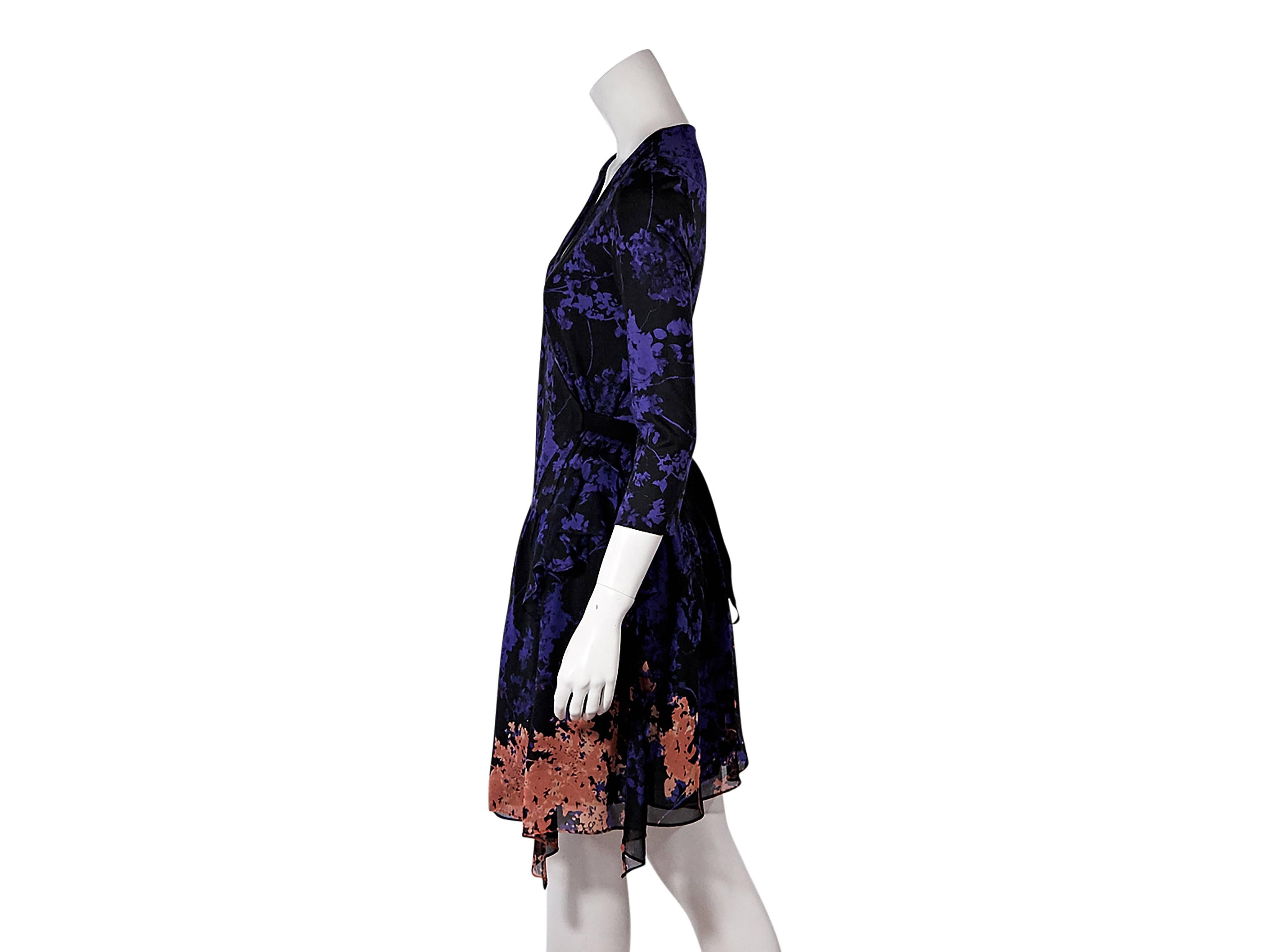 Product details:  Multicolor floral-print wrap dress by Diane von Furstenberg.  V-neck.  Three-quarter length sleeves.  Size 10
Condition: Pre-owned. Very good.

Est. Retail $ 525.00