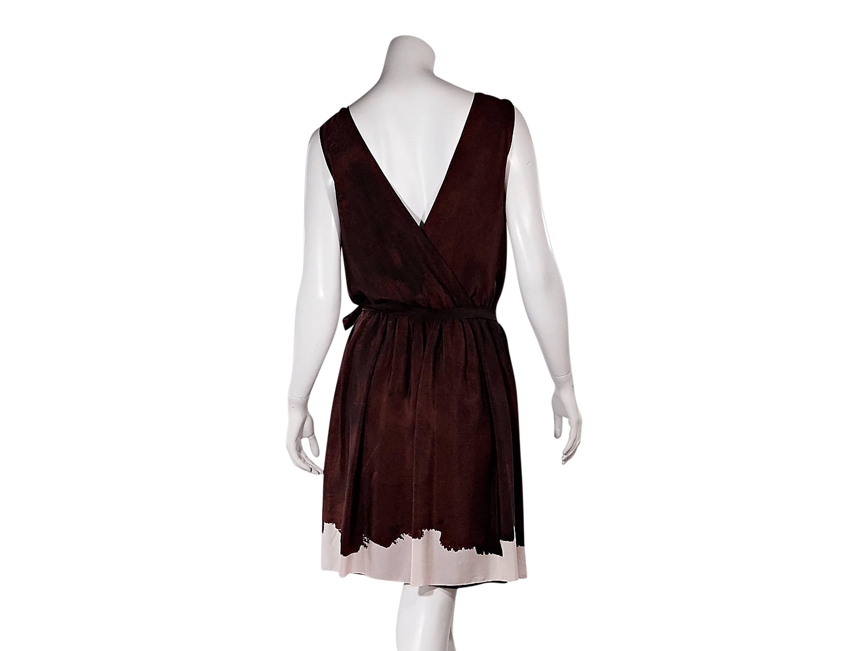 Product details:  Burgundy silk wrap dress by Thakoon.  V-neck.  Sleeveless.  Bow accents at shoulders.  Pleated skirting.  Crossover back.  Pink dip-dyed hem. Size 8
Condition: Pre-owned. Very good.

Est. Retail $ 998.00