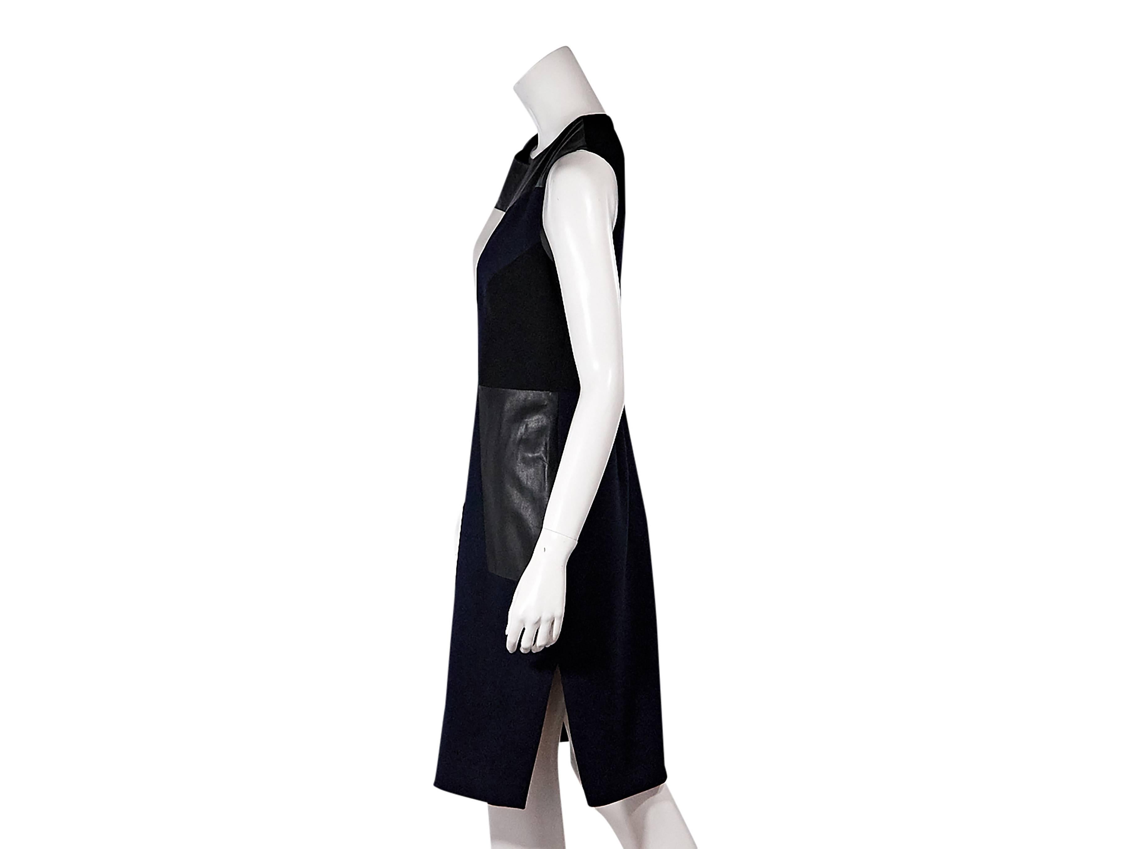 Product details:  Navy, black and white colorblock sheath dress by Prabal Gurung.  Accented with leather panels.  Jewelneck.  Sleeveles.  Concealed back zip closure.  Size small
Condition: Pre-owned. Very good.

Est. Retail $ 990.00