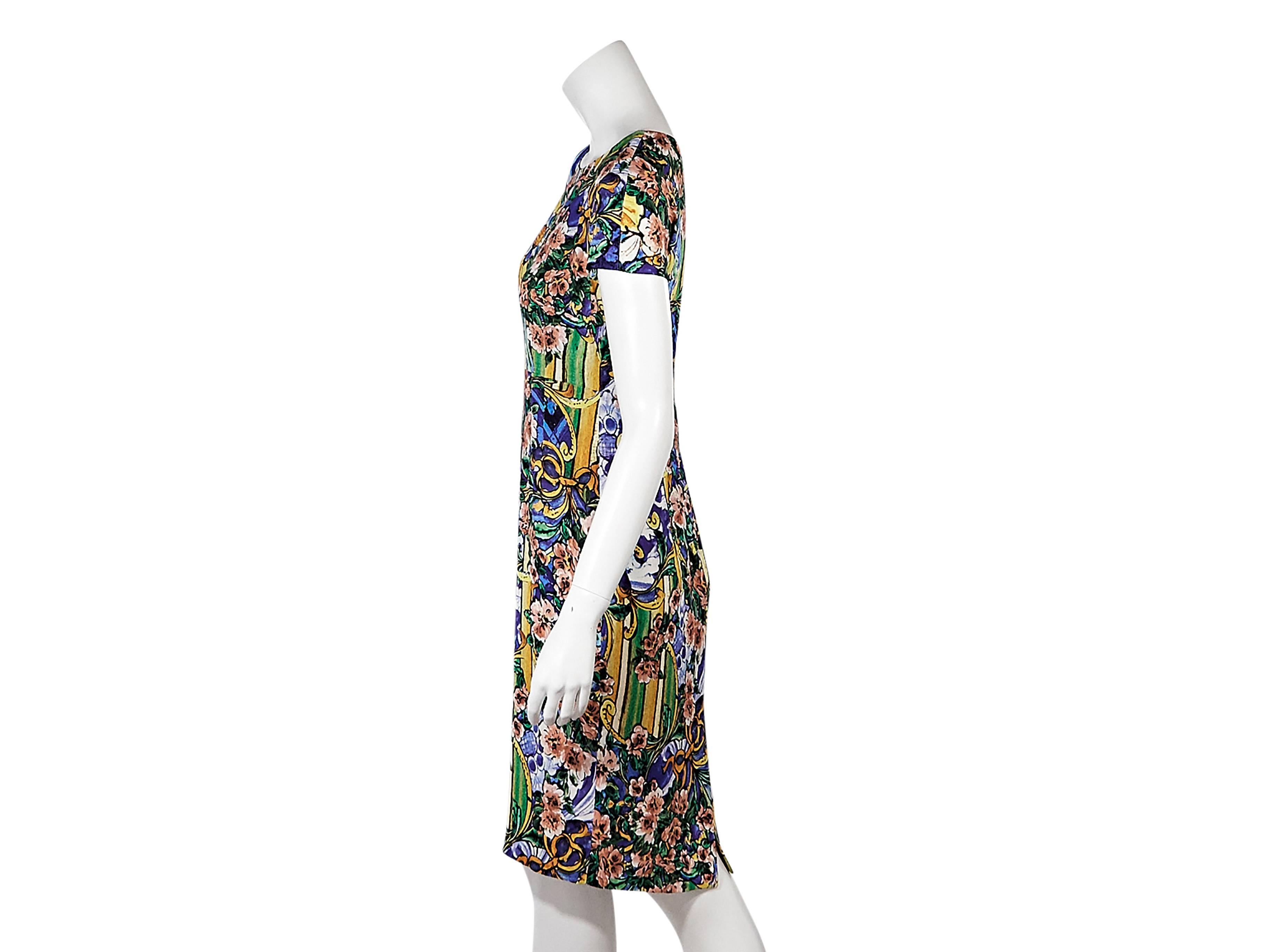 Product details:  Multicolor floral-printed sheath dress by Dolce & Gabbana.  From the Spring 2013 collection.  Jewelneck.  Short sleeves.  Concealed back zip closure.  Center back hem vent. Size S
Condition: Pre-owned. Very good.

Est. Retail $