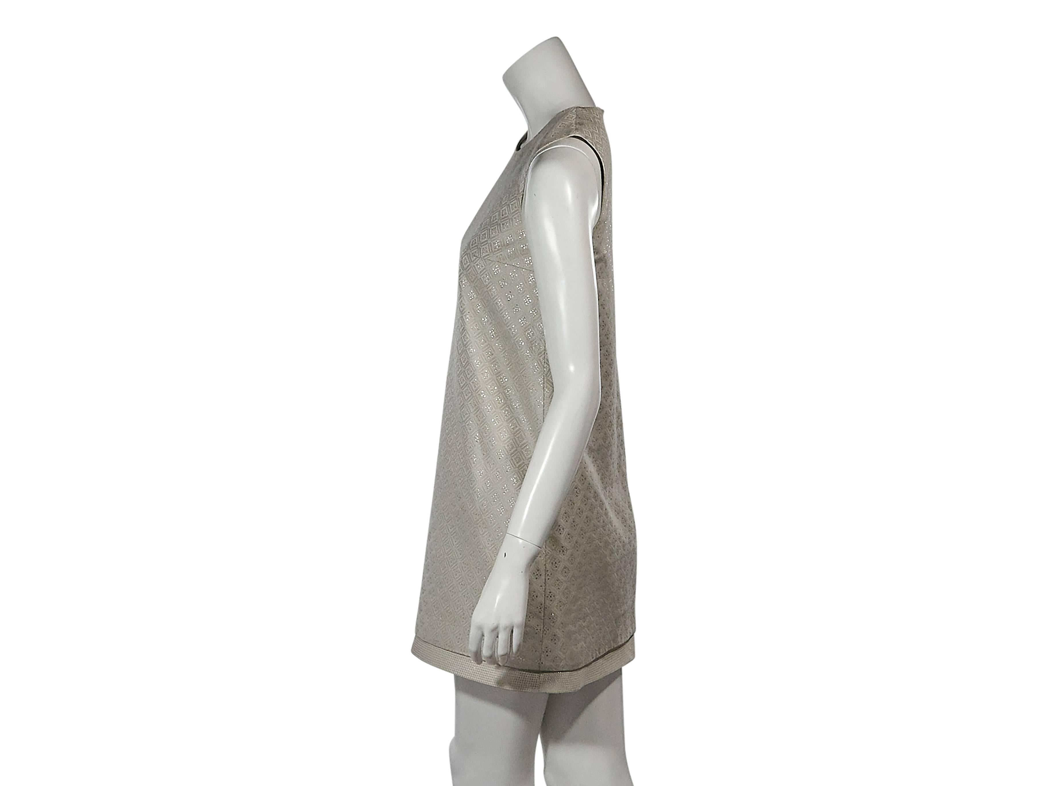 Product details:  Metallic beige shift dress by Gucci.  Jewelneck.  Sleeveless.  Concealed back zip closure.  Size 2
Condition: Pre-owned. Very good.

Est. Retail $ 898.00