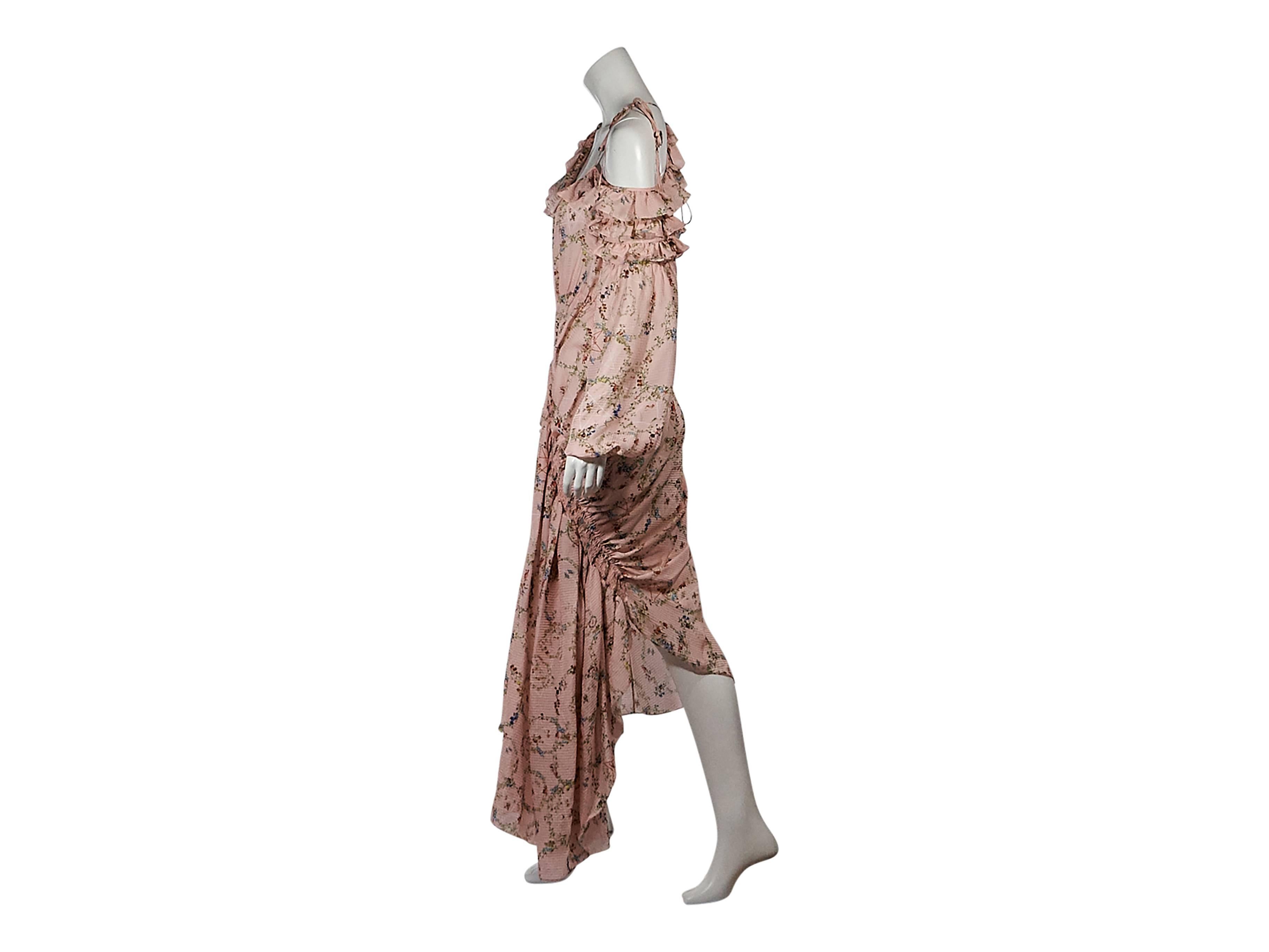Product details: Pink floral-printed asymmetrical dress by Preen by Thornton Bregazzi. Accented with ruffles. Scoopneck. Long sleeves. Single cold shoulder. Asymmetrical stretch waist. Side gathered hem. Pullover style. 
Condition: Pre-owned. Very