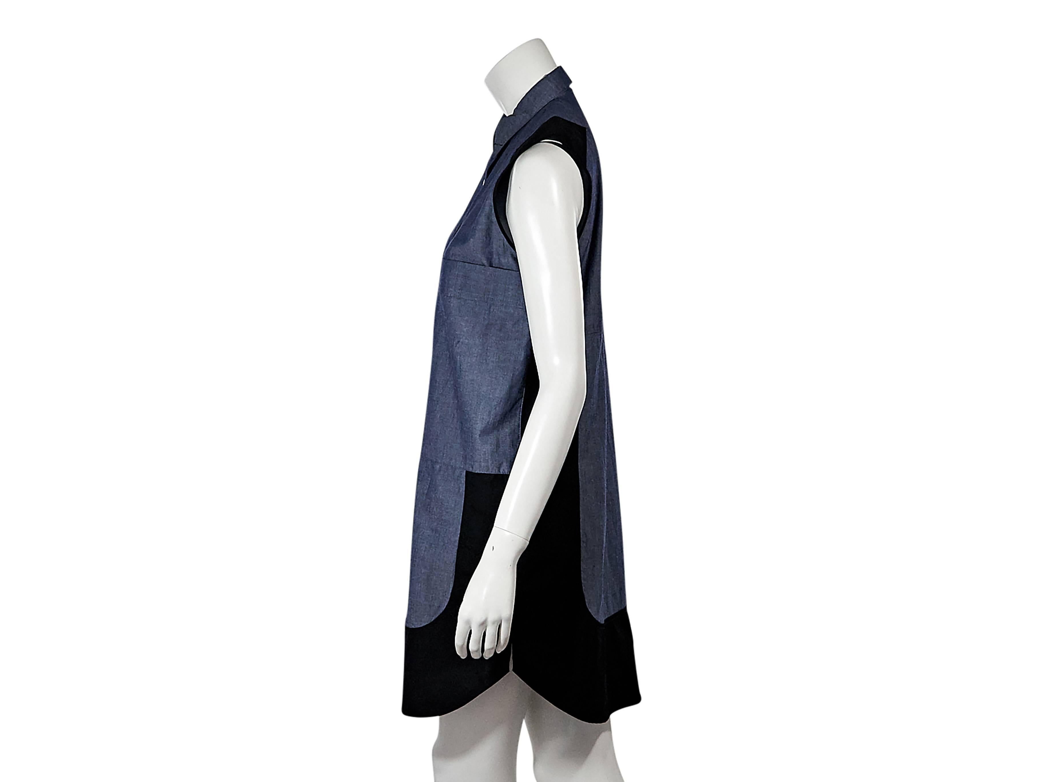 Product details:  Blue chambray colorblock shirtdress by Proenza Schouler.  Point collar.  Sleeveless.  Snap placket over zip-front closure.  Chest patch pockets.  Shirttail hem. Size 2
Condition: Pre-owned. Very good.

Est. Retail $ 598.00