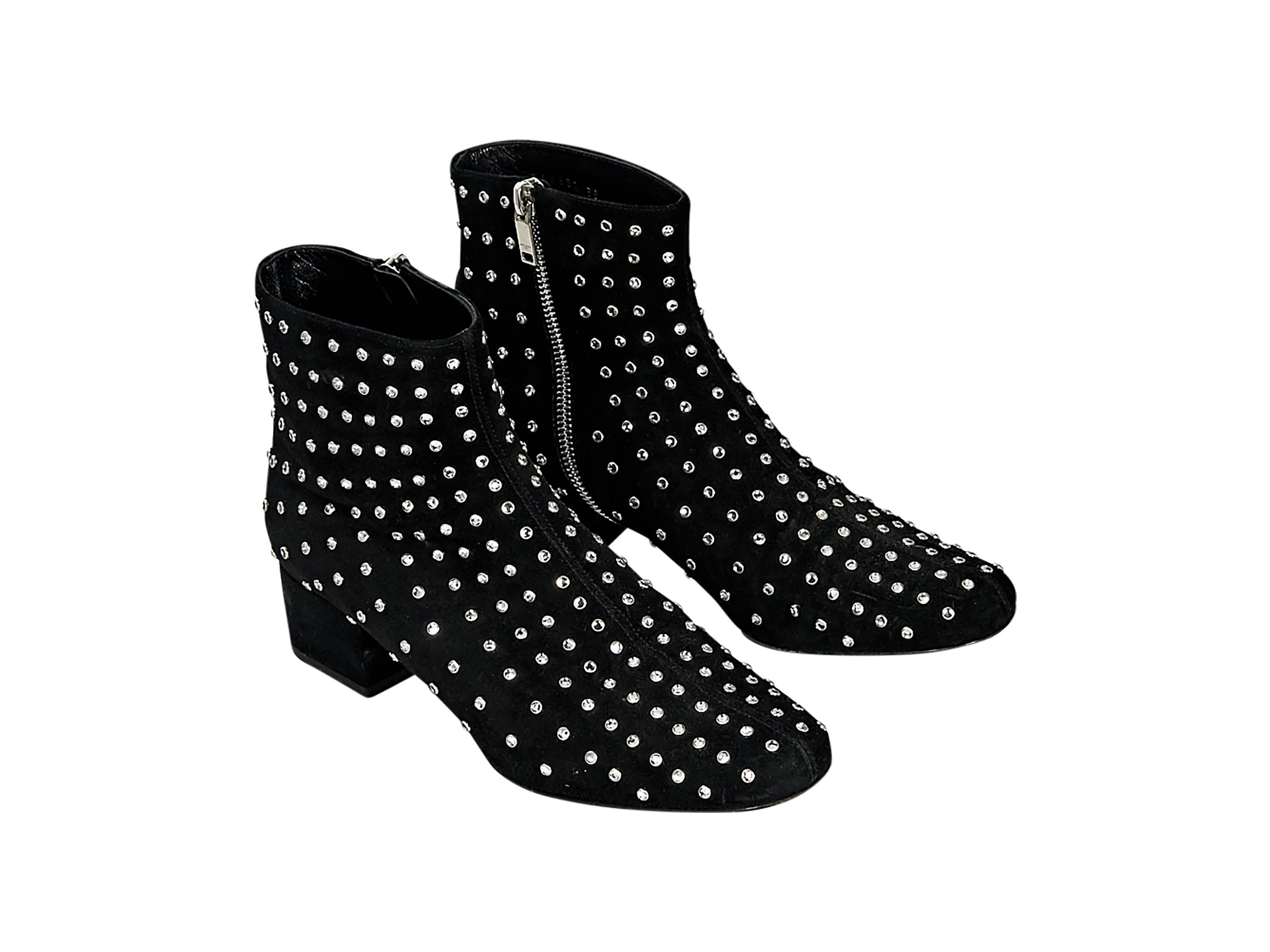Product details:  Black suede Babies embellished ankle boots by Saint Laurent.  Inner zip closure.  Round toe.  Low block heel. Size 8
Condition: Pre-owned. Very good.

Est. Retail $ 1,564.00