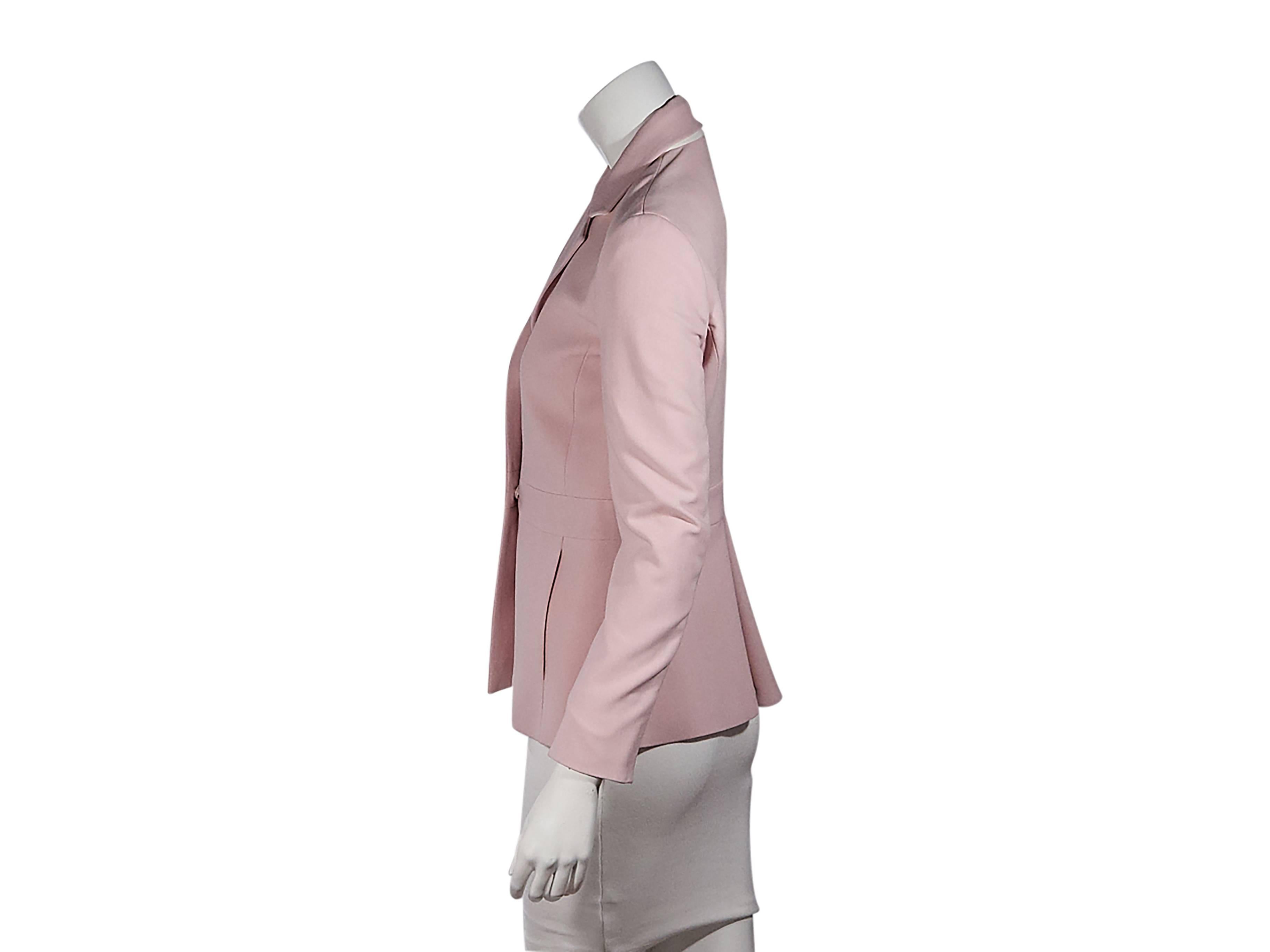 Product details:  Pink blazer by Fendi.  Notched lapel.  Bracelet-length sleeves.  Concealed front closure.  On-seam slide pockets.  Back box pleat at hem. Size 4
Condition: Pre-owned. Very good.

Est. Retail $ 1,300.00
