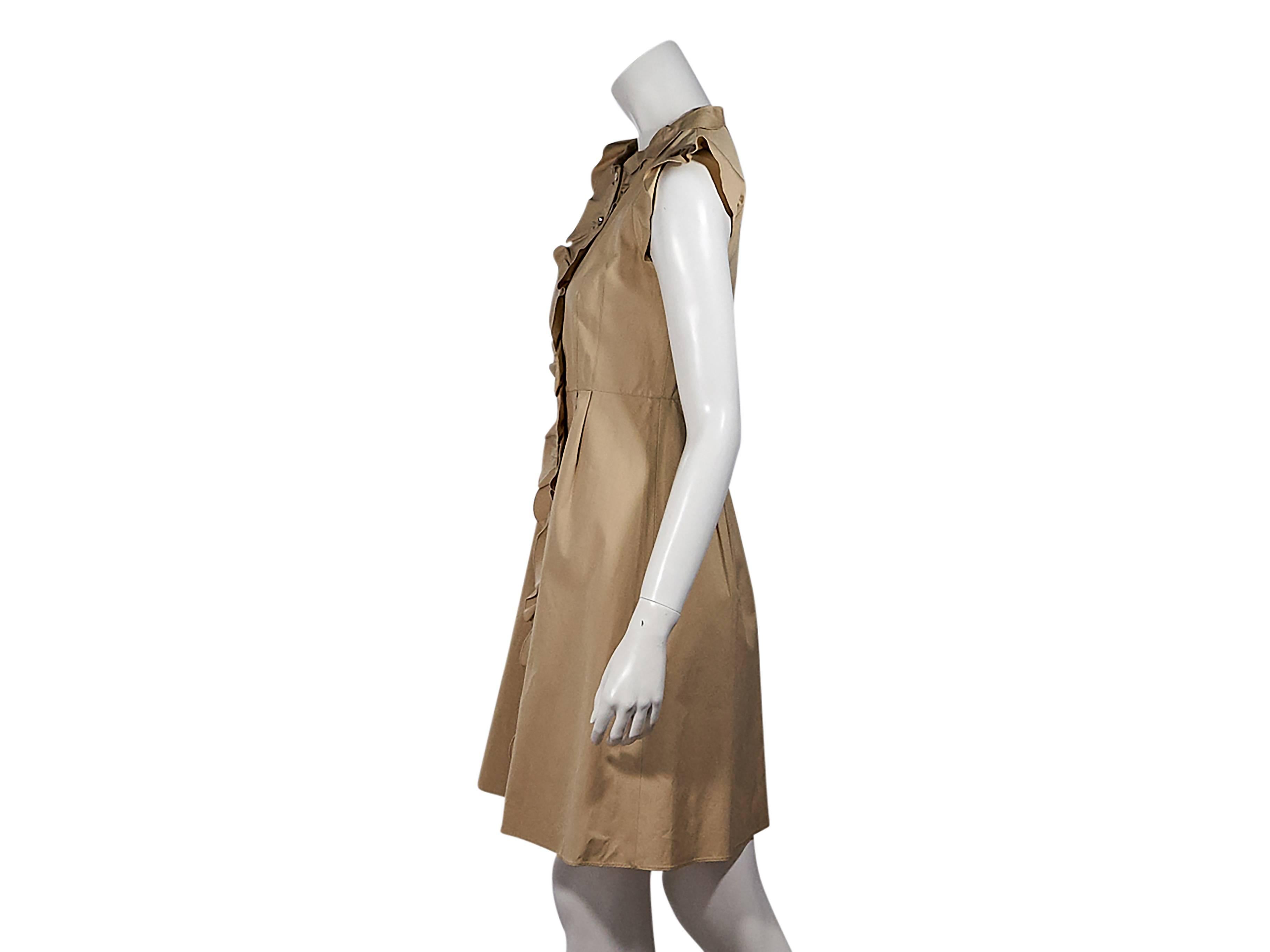 Product details:  Tan ruffled shirt dress by Valentino.  Crewneck.  Ruffled cap sleeves.  Button-front closure.  Pleats taper off waist. Size 6
Condition: Pre-owned. Very good.

Est. Retail $ 2,300.00
