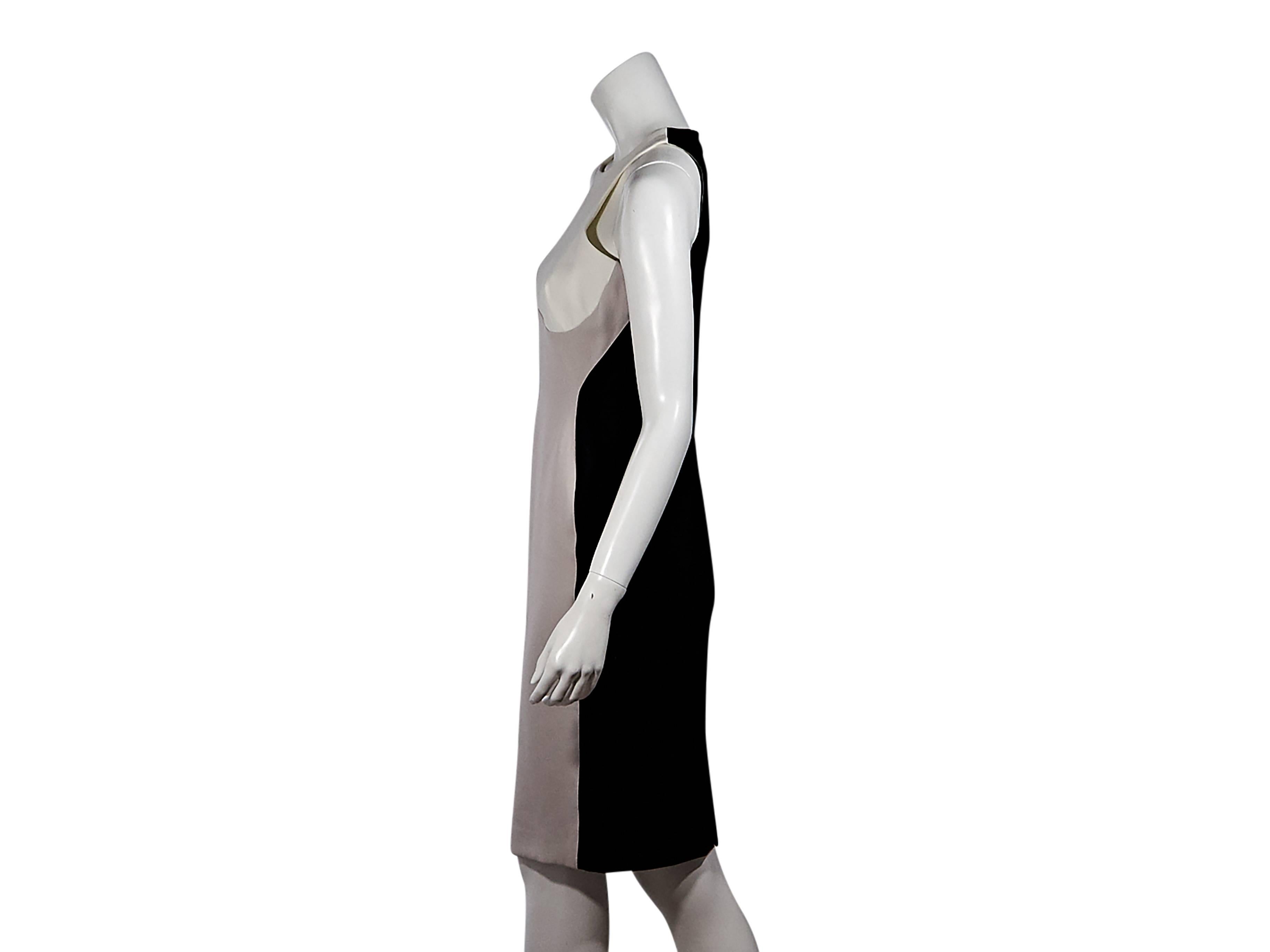 Product details:  Flattering colorblock sheath dress by Stella McCartney.  Jewelneck.  Sleeveless.  Concealed back zip closure.  Back hem vent. Size 6
Condition: Pre-owned. Very good.

Est. Retail $ 1,595.00