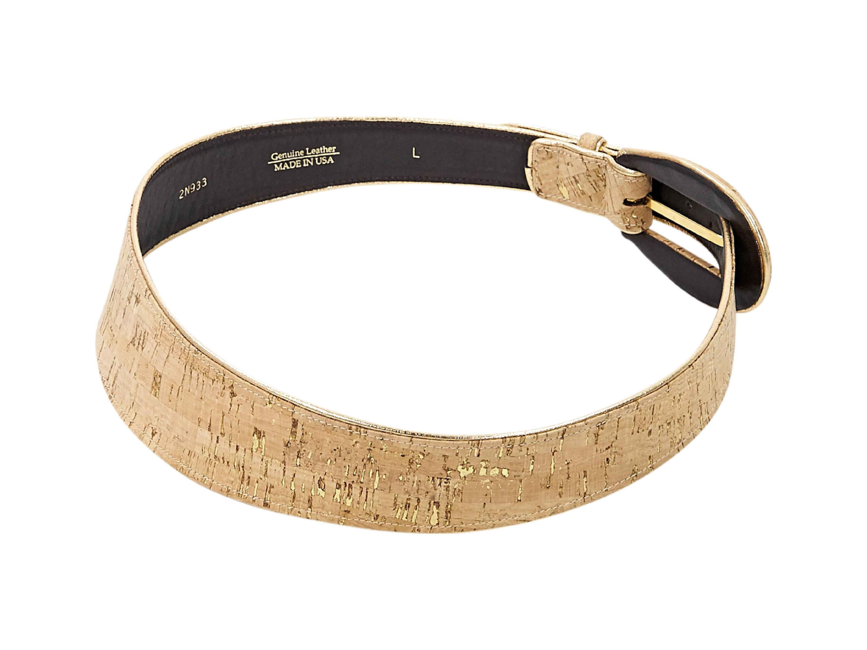 Product details:  Tan cork belt by Oscar de la Renta.  Adjustable buckle closure.  Goldtone hardware. Size L. Length to first hole- 80 cm/31.5 inches, Length to last hole- 90 cm/ 35.5 inches 
Condition: Pre-owned. Very good. 

Est. Retail $ 598.00
