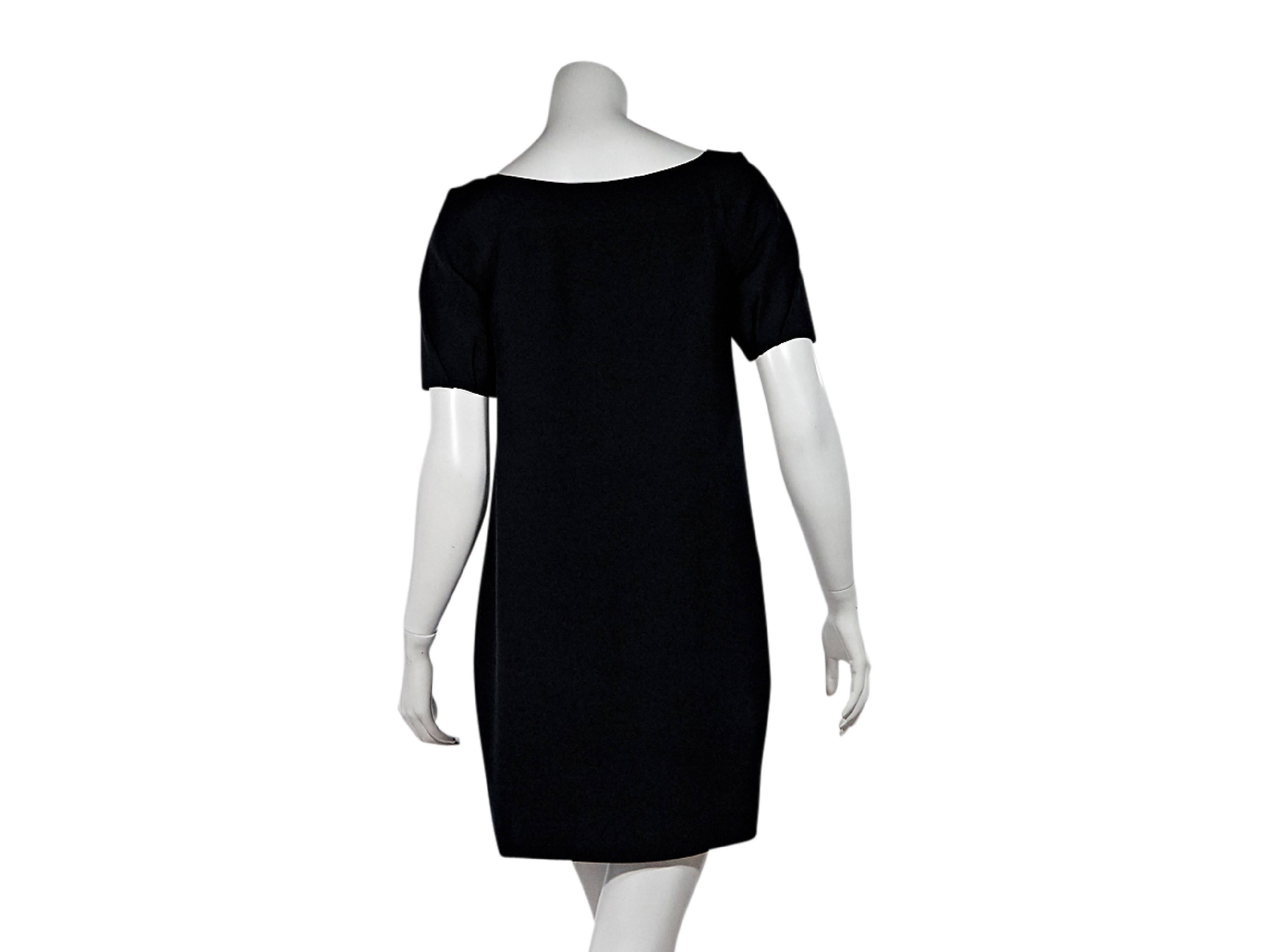 Product details:  Black shift dress by Chloé.  Features a cutout detail.  Wide scoopneck.  Short sleeves.  Pullover style. 
Condition: Pre-owned. Very good.

Est. Retail $ 428.00
