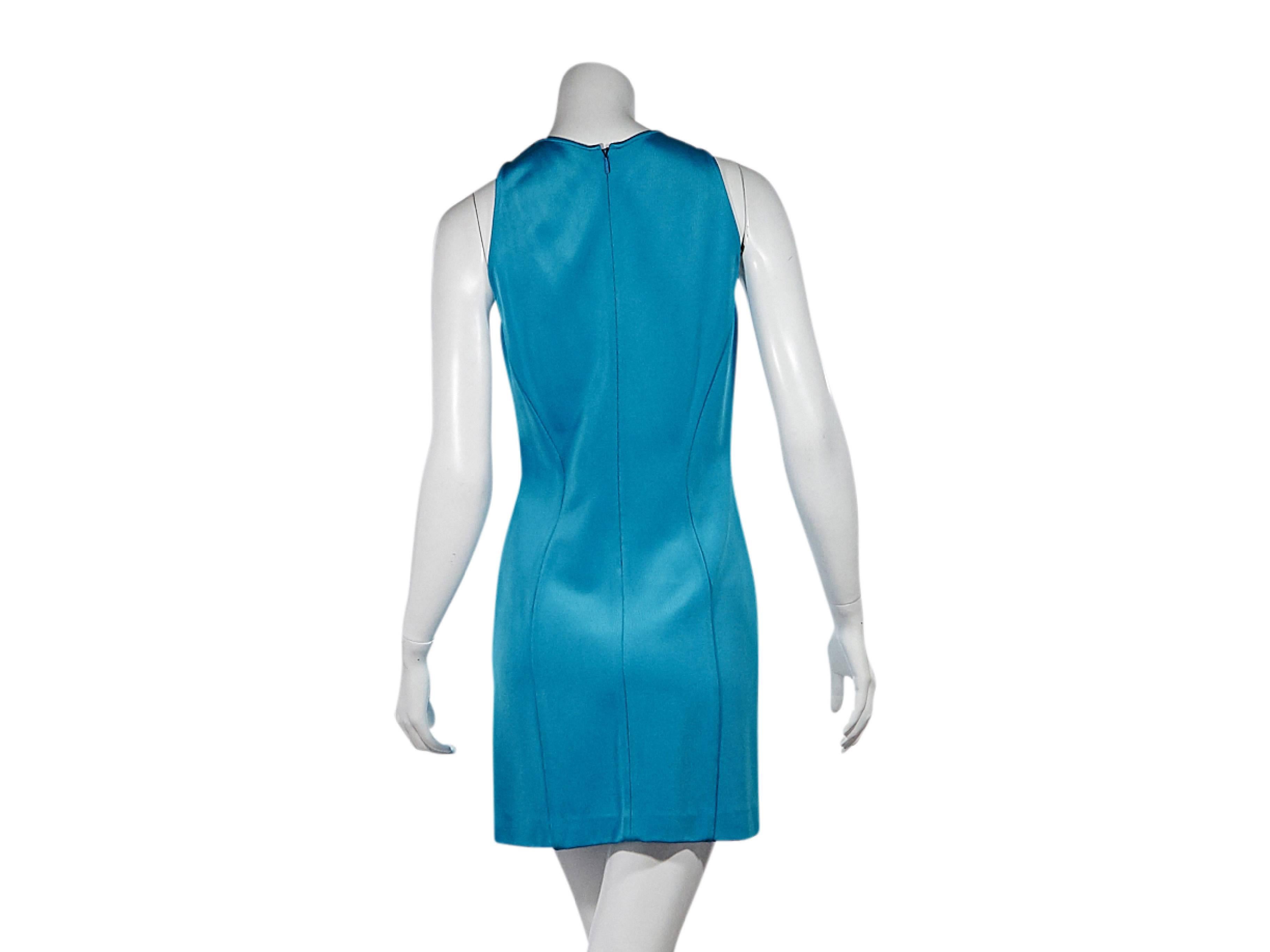 Product details:  Blue sheath dress by Versace.  Accented with goldtone buttons.  Jewelneck.  Sleeveless.  Flattering seam details.  Concealed back zip closure.  Size 8
Condition: Pre-owned. Very good.

Est. Retail $ 698.00