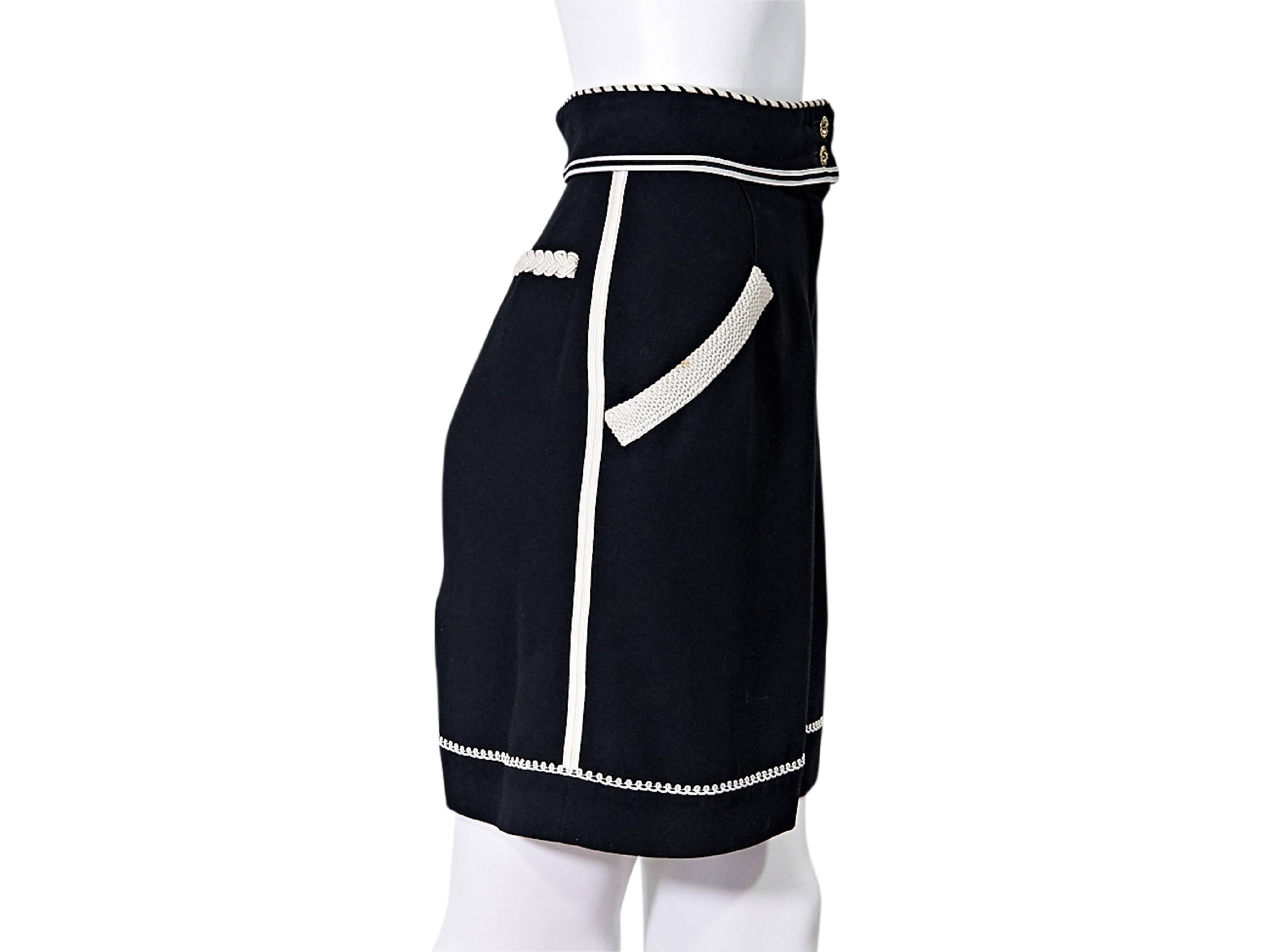 Product details:  Vintage black and white high-waisted shorts by Chanel.  Double button closure.  Zip fly.  Waist slant slide pockets.  Back besom pockets.  Label size FR 38. 
Condition: Pre-owned. Very good.

Est. Retail $ 1,198.00
