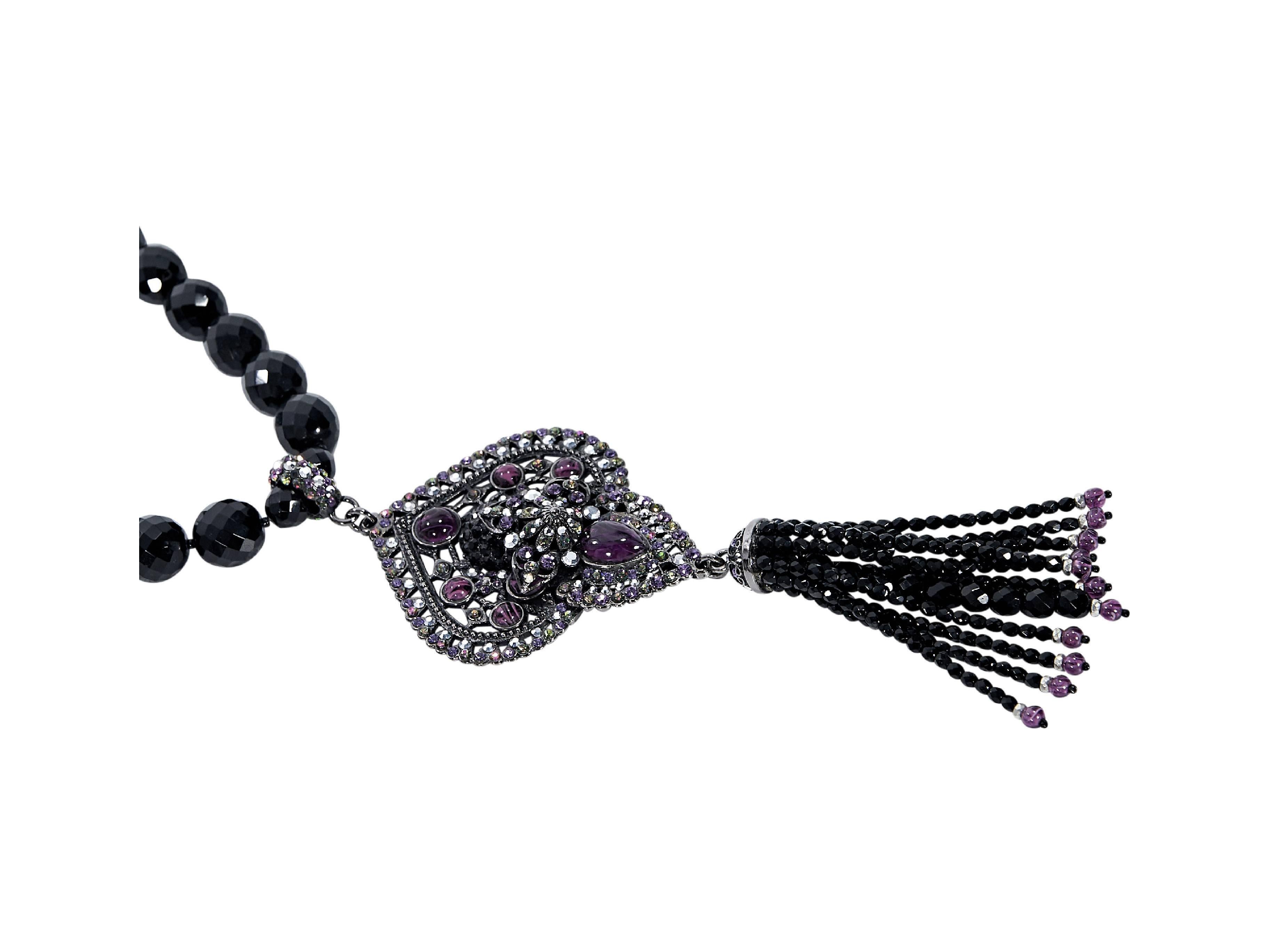 Product details:  Black crystal statement necklace by Barrera.  Beaded single strand.  Hanging pendant with tassel.  
Condition: Pre-owned. Very good.

Est. Retail $ 695.00
