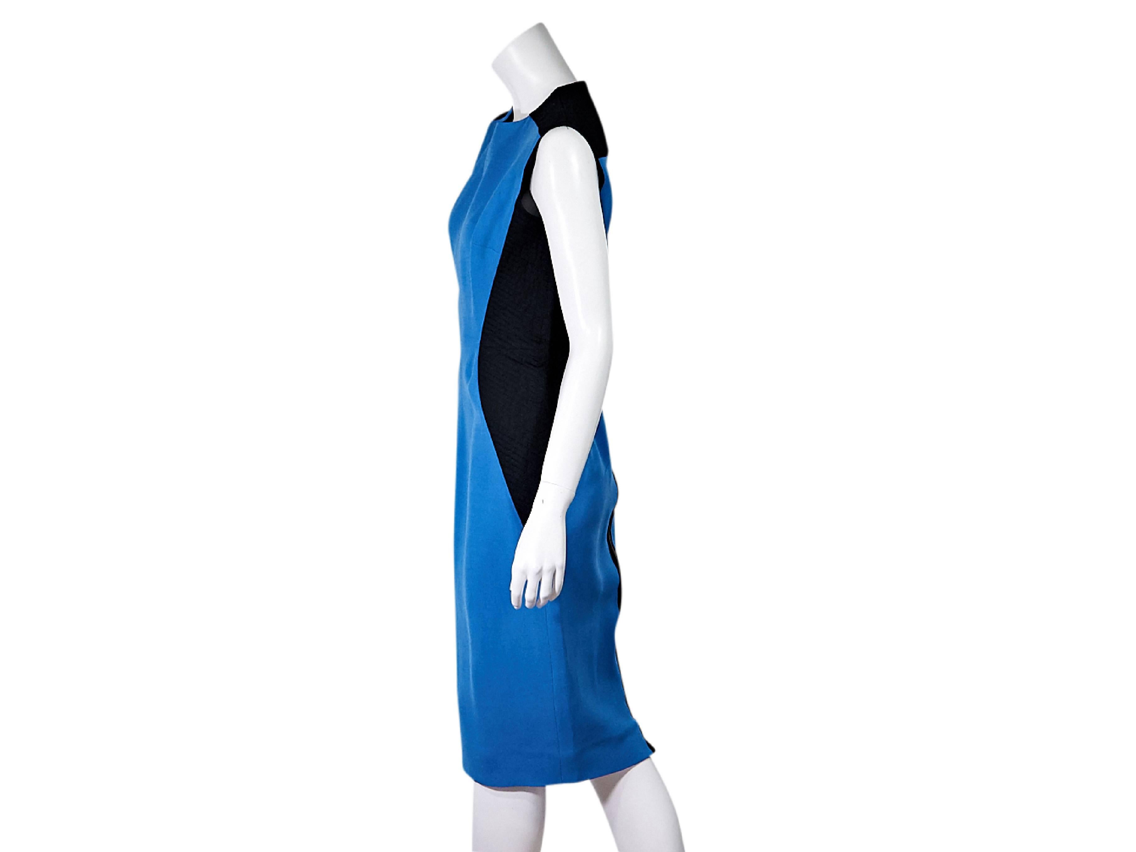 Product details:  Blue and black sheath dress by Victoria Beckham.  Flattering colorblock design.  Crewneck.  Sleeveless.  Back zip closure.  Size 10
Condition: Pre-owned. Very good.

Est. Retail $ 1,700.00
