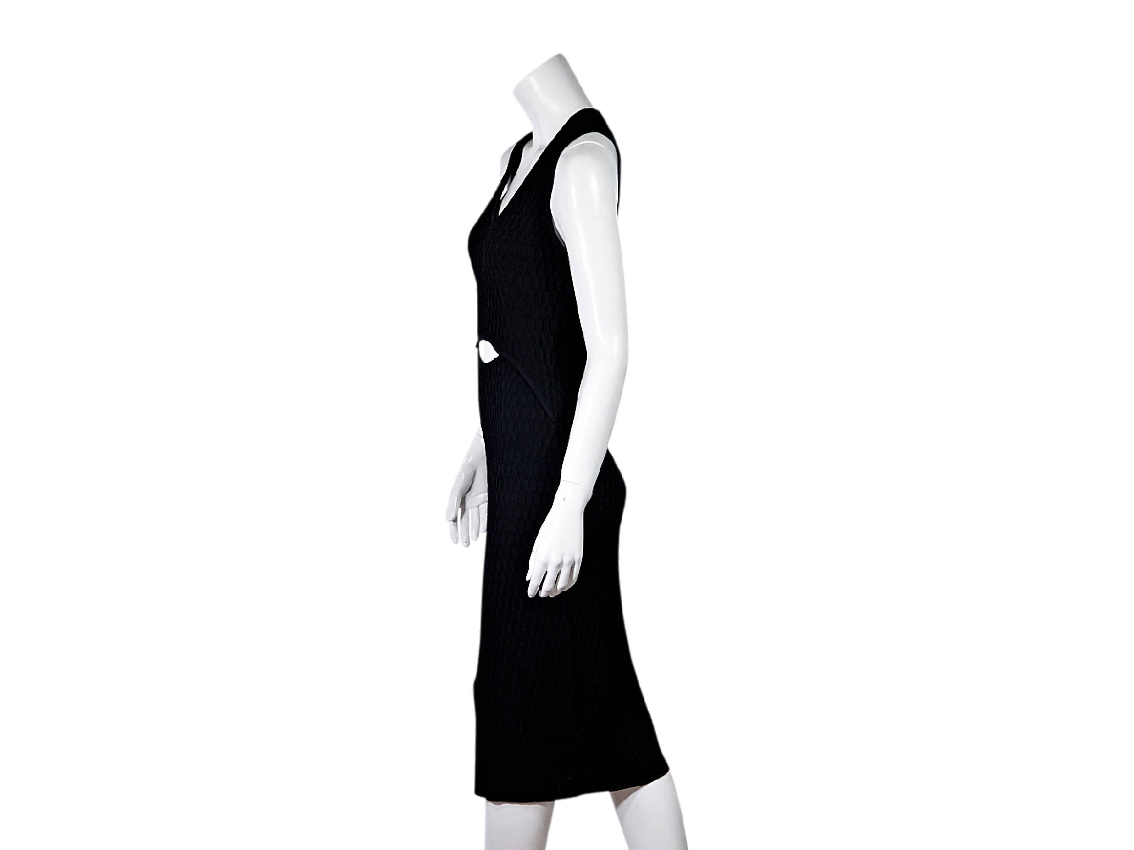 Product details:  Black knit sheath dress by Jonathan Simkhai.  Features a cutout accent.  Scoopneck.  Sleeveless.  Pullover style. Size M
Condition: Pre-owned. Very good.

Est. Retail $ 495.00